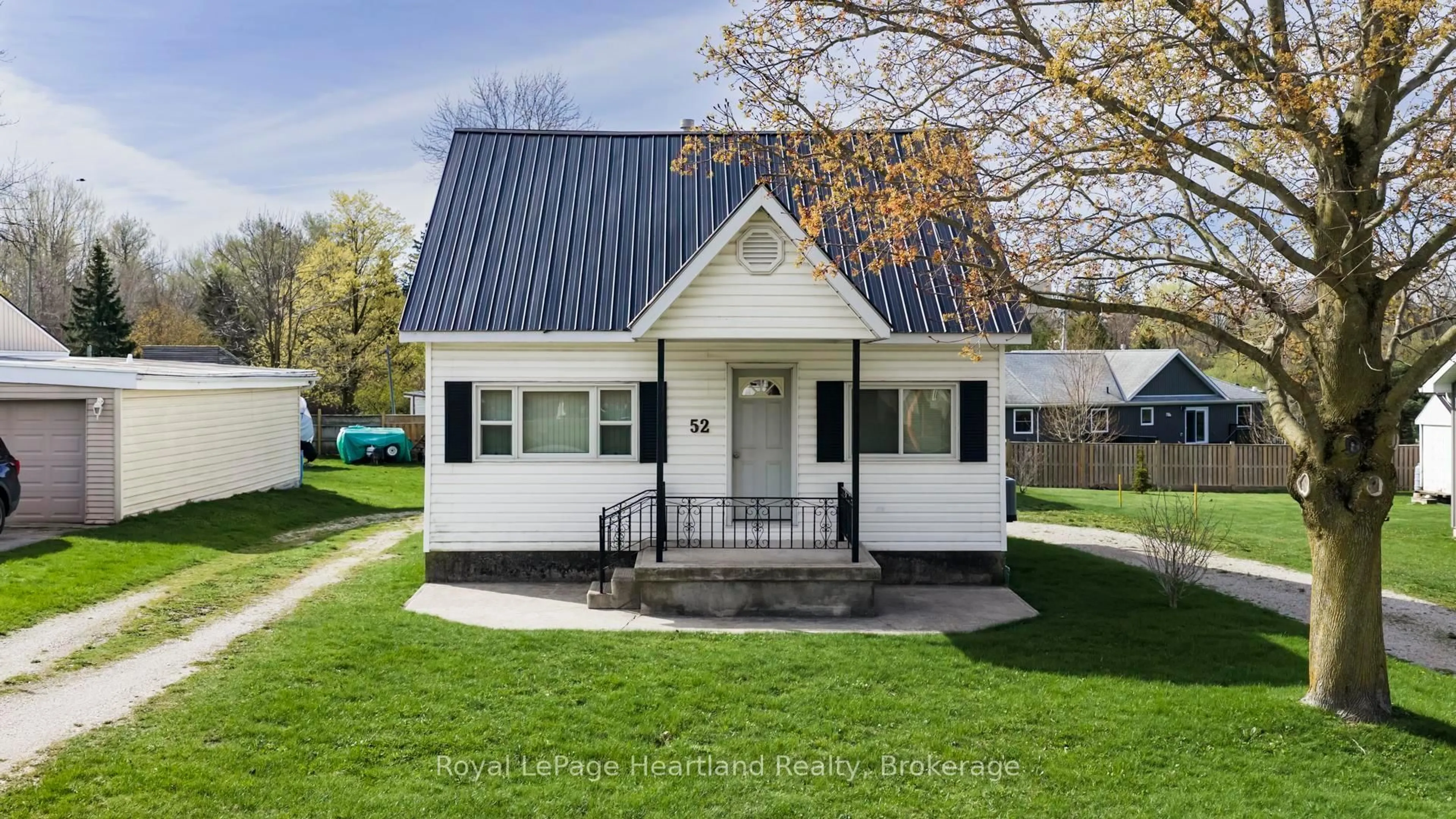 Home with vinyl exterior material, street for 52 Walker St, Central Huron Ontario N0M 1L0