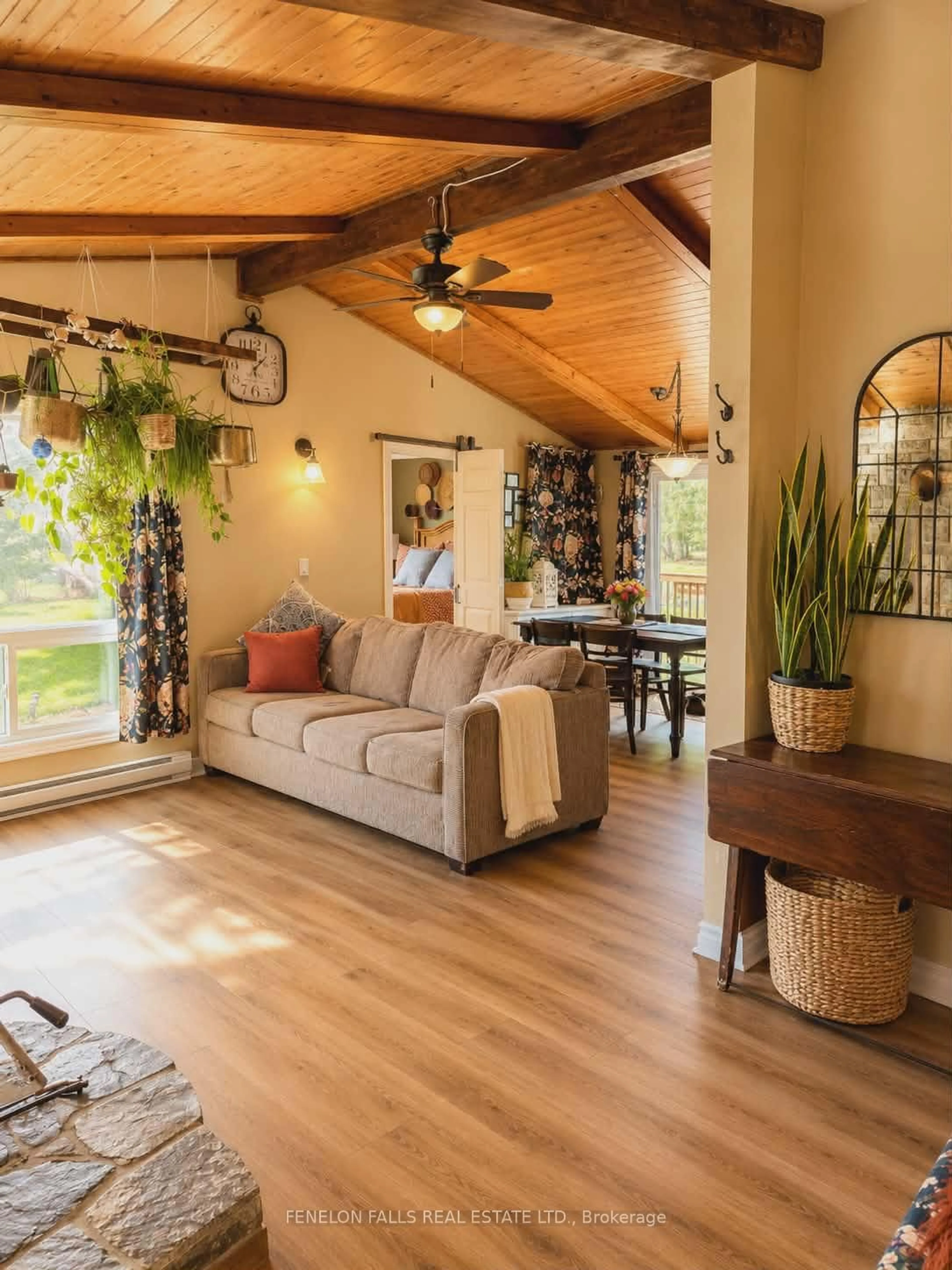 Living room with furniture, wood/laminate floor for 117 Echo Bay Rd, Kawartha Lakes Ontario K0M 1A0