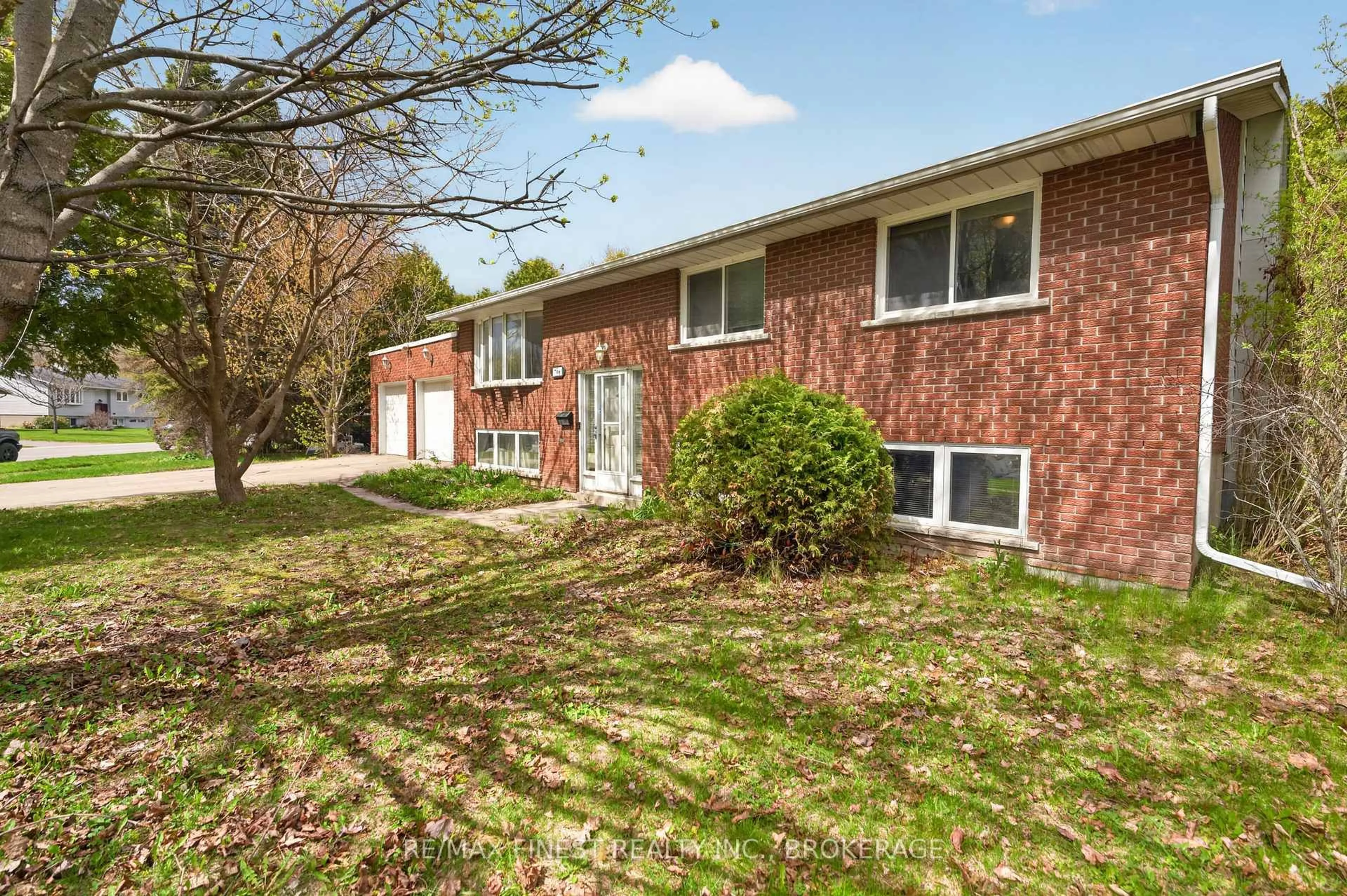 Home with brick exterior material, street for 706 High Gate Park Dr, Kingston Ontario K7M 5Z9