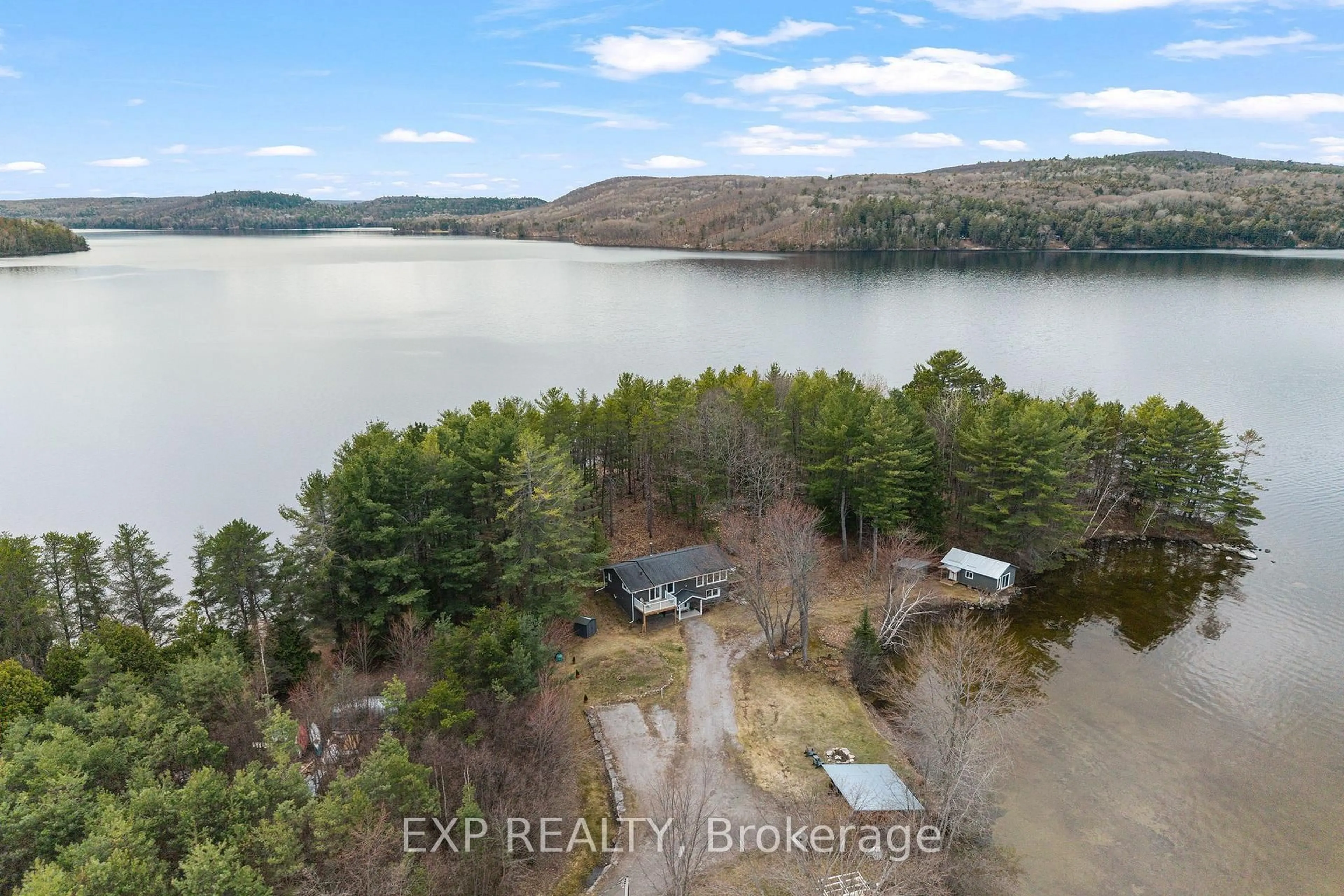 A pic from outside/outdoor area/front of a property/back of a property/a pic from drone, water/lake/river/ocean view for 59 Strack Lane, Barry's Bay Ontario K0J 1B0