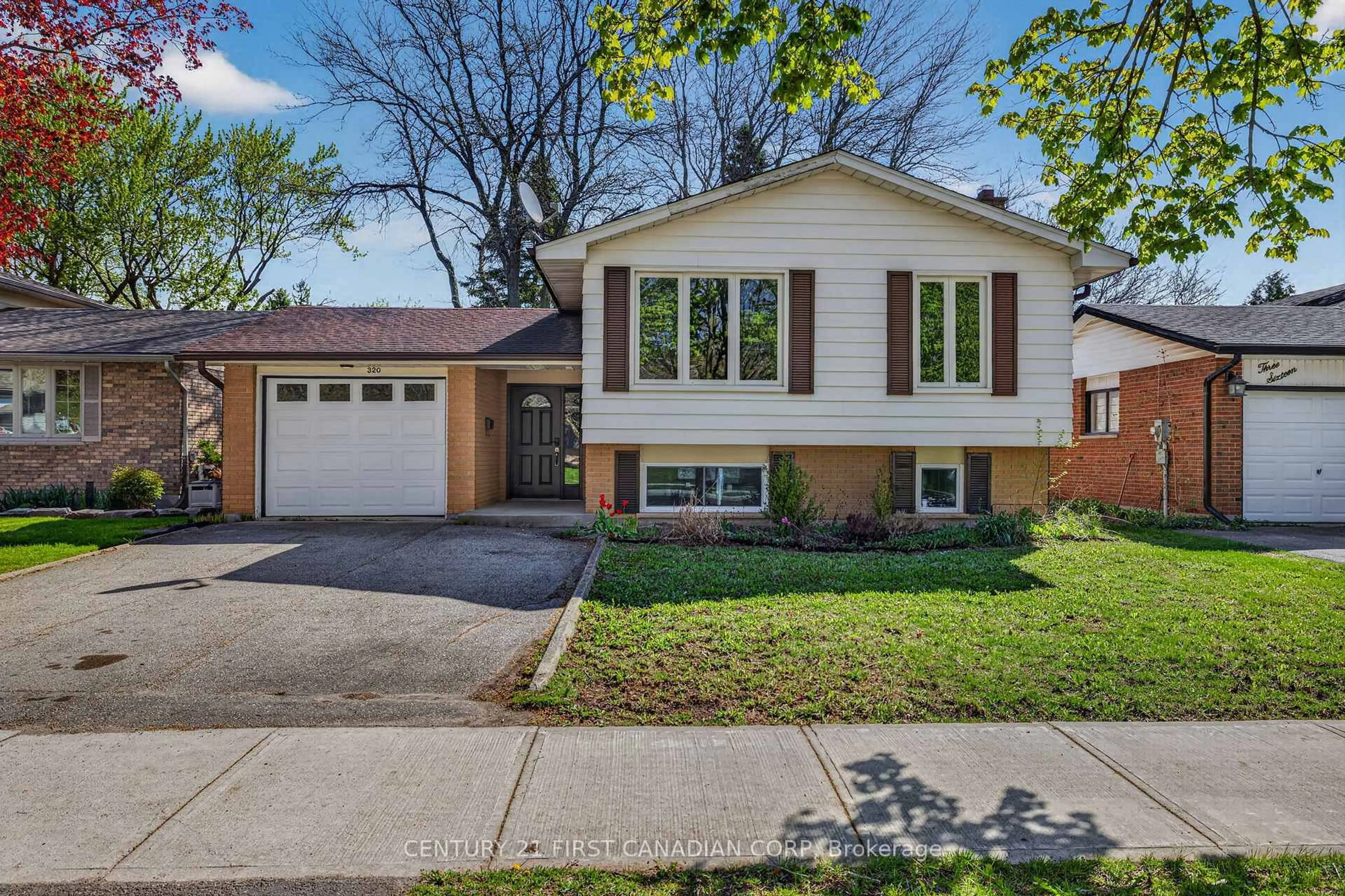 Home with brick exterior material, street for 320 Blue Forest Dr, London North Ontario N6G 3K3
