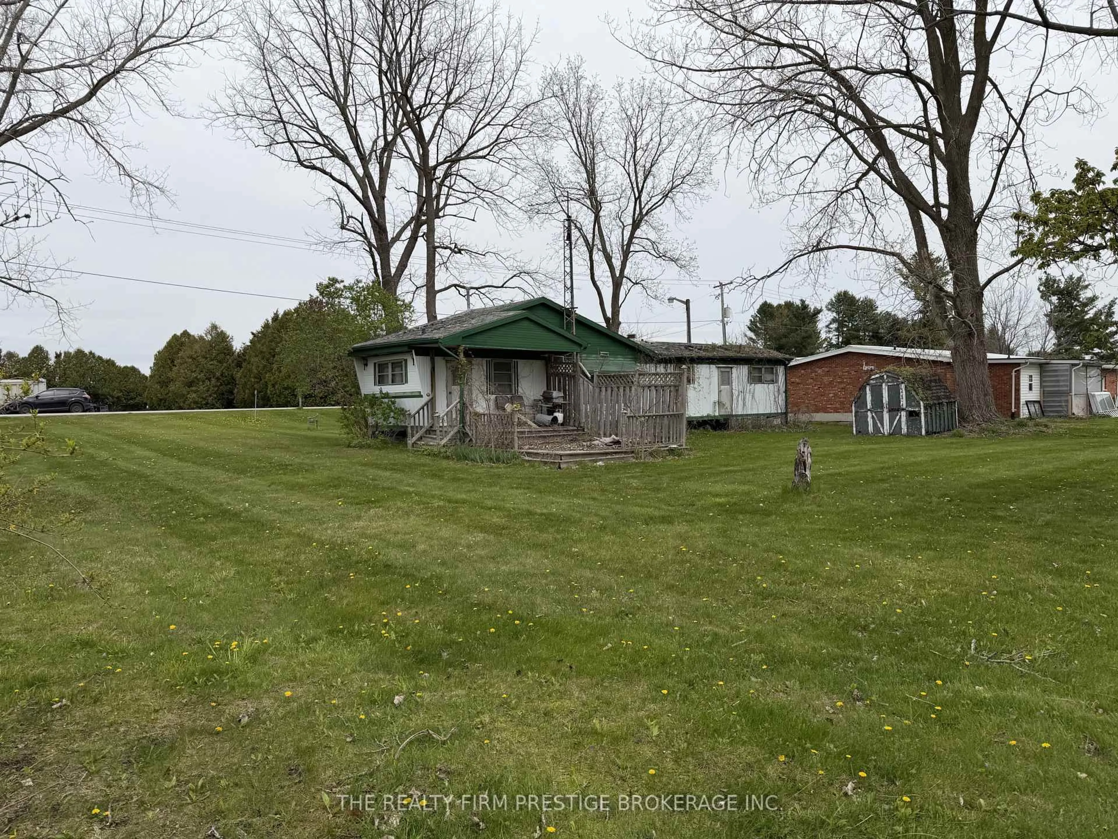 A pic from outside/outdoor area/front of a property/back of a property/a pic from drone, unknown for 24331 Pioneer Line, West Elgin Ontario N0L 2P0