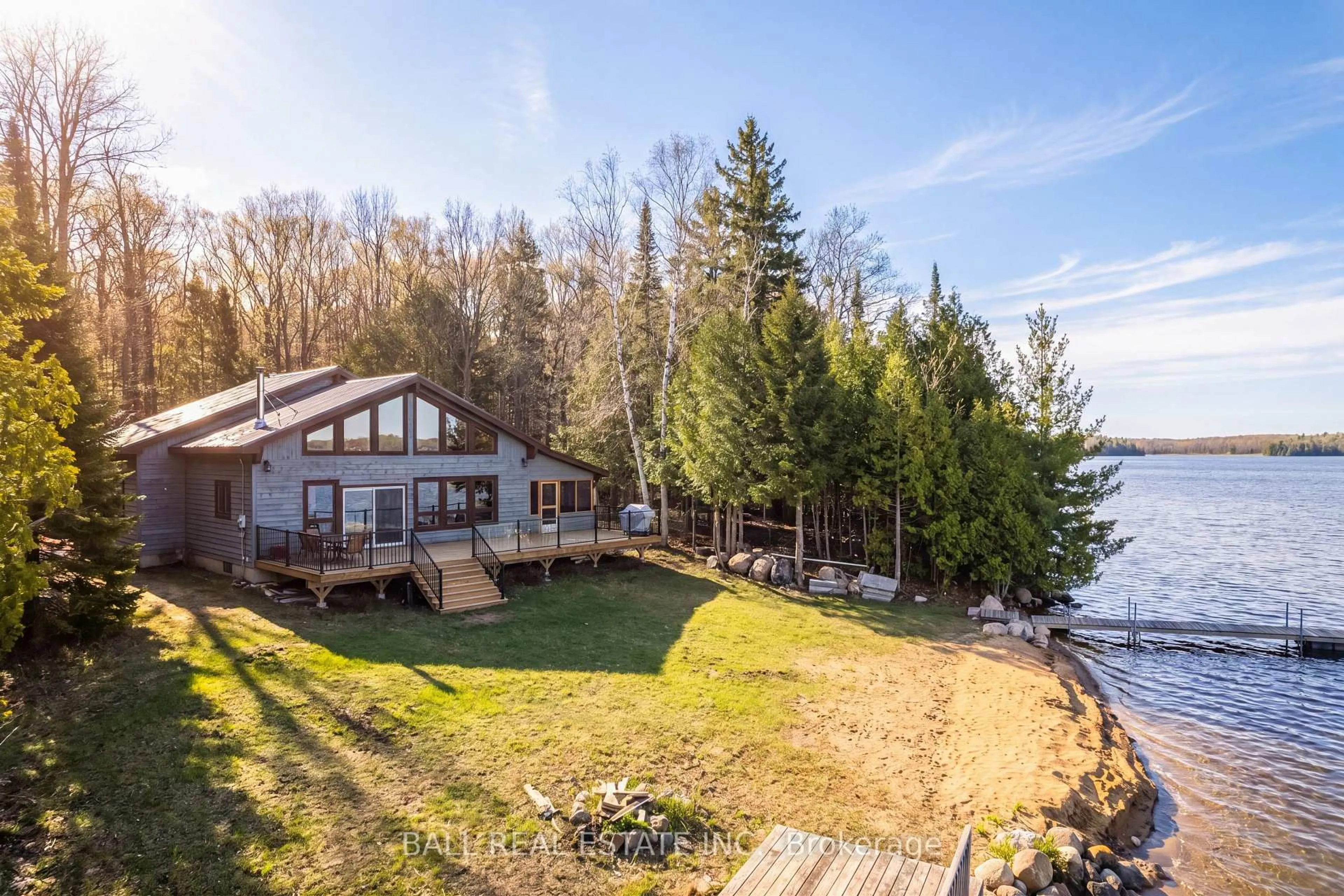 A pic from outside/outdoor area/front of a property/back of a property/a pic from drone, water/lake/river/ocean view for 1154 Surveyor Dr, Highlands East Ontario K0L 2Y0