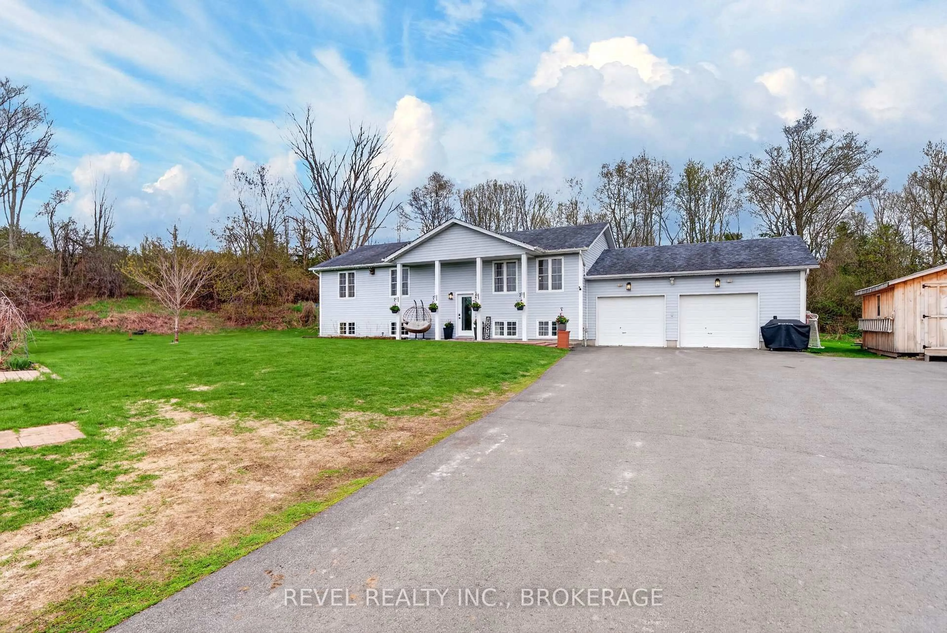 A pic from outside/outdoor area/front of a property/back of a property/a pic from drone, street for 4095 Graham Rd, Harrowsmith Ontario K0H 1V0