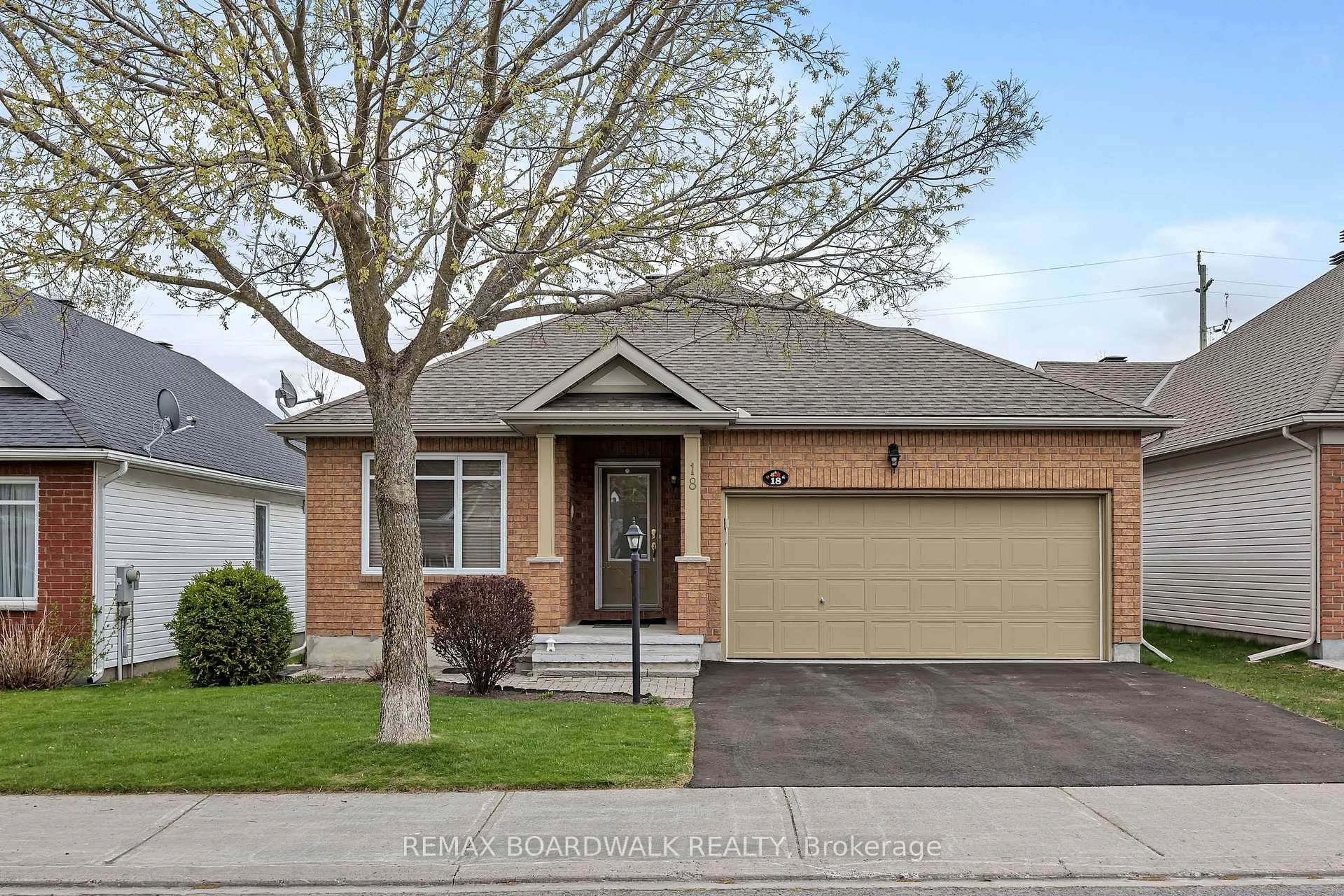 Home with brick exterior material, street for 18 Fieldcrest Ave, Ottawa Ontario K2J 4W7