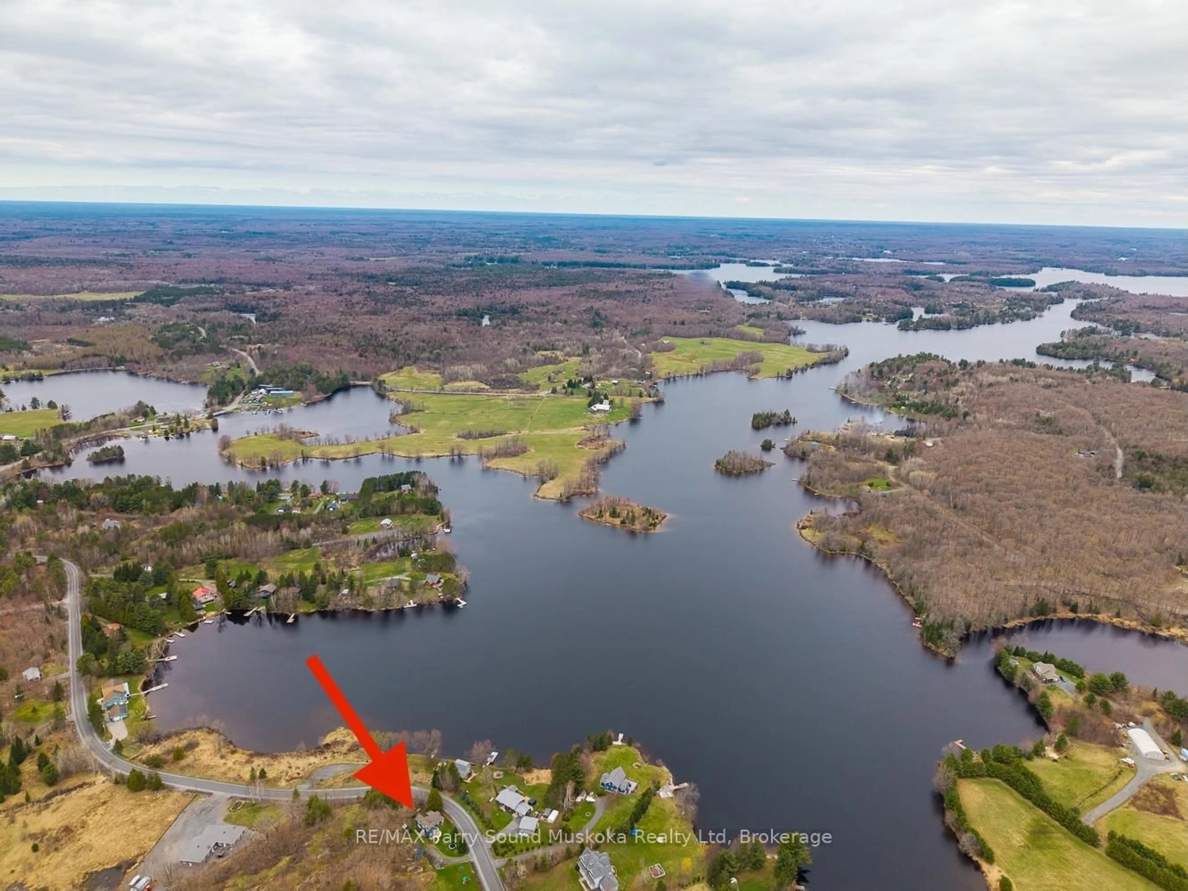 A pic from outside/outdoor area/front of a property/back of a property/a pic from drone, water/lake/river/ocean view for 569 Hurdville Rd, McKellar Ontario P2A 0B5