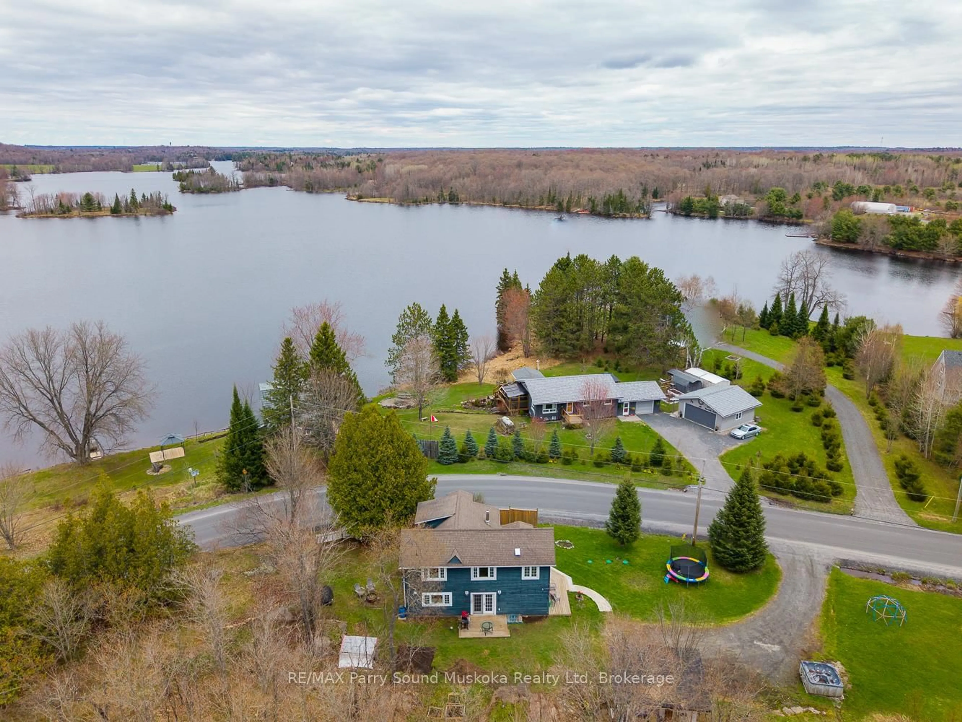 A pic from outside/outdoor area/front of a property/back of a property/a pic from drone, water/lake/river/ocean view for 569 Hurdville Rd, McKellar Ontario P2A 0B5