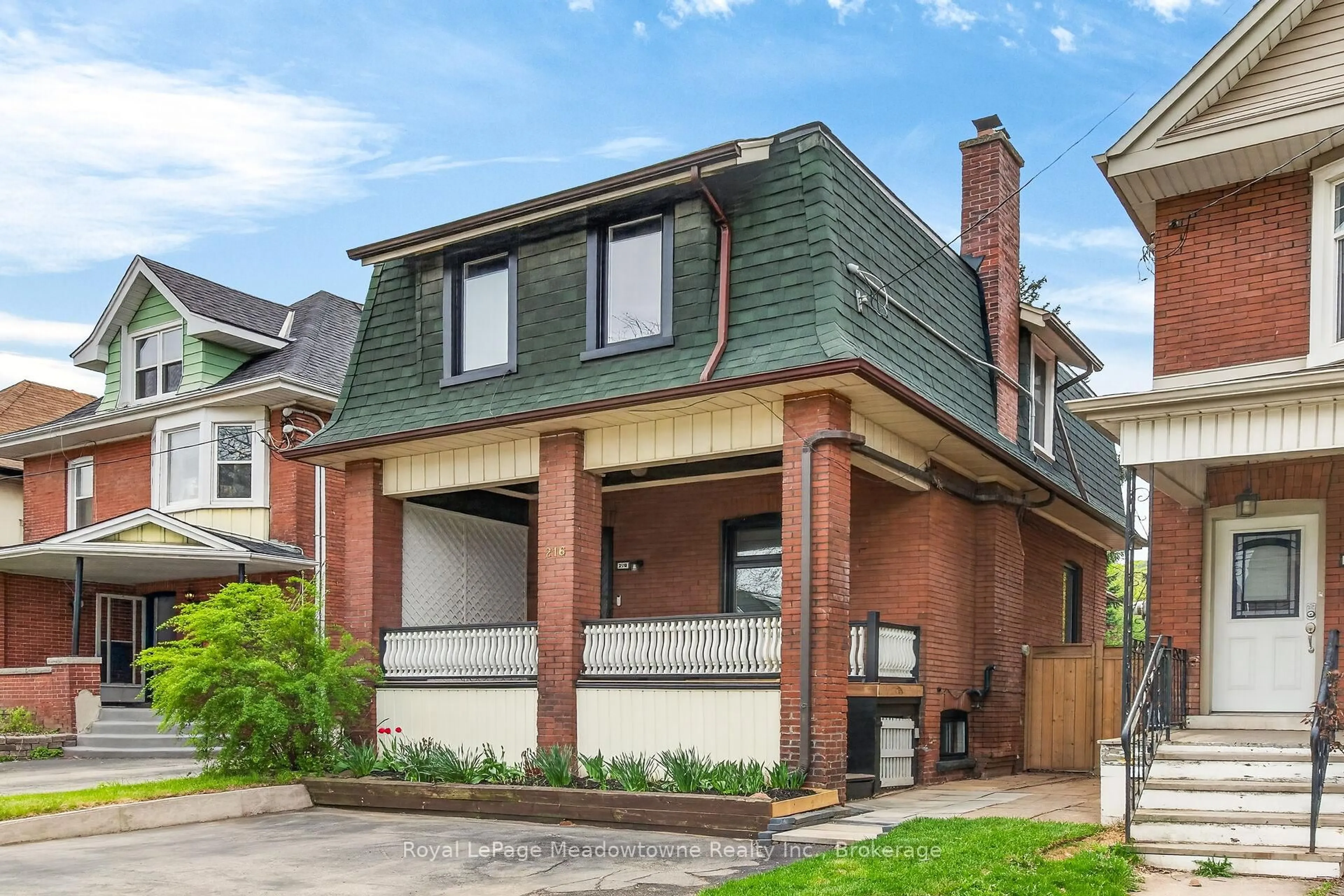 Home with brick exterior material, street for 216 Maplewood Ave, Hamilton Ontario L8M 1X8