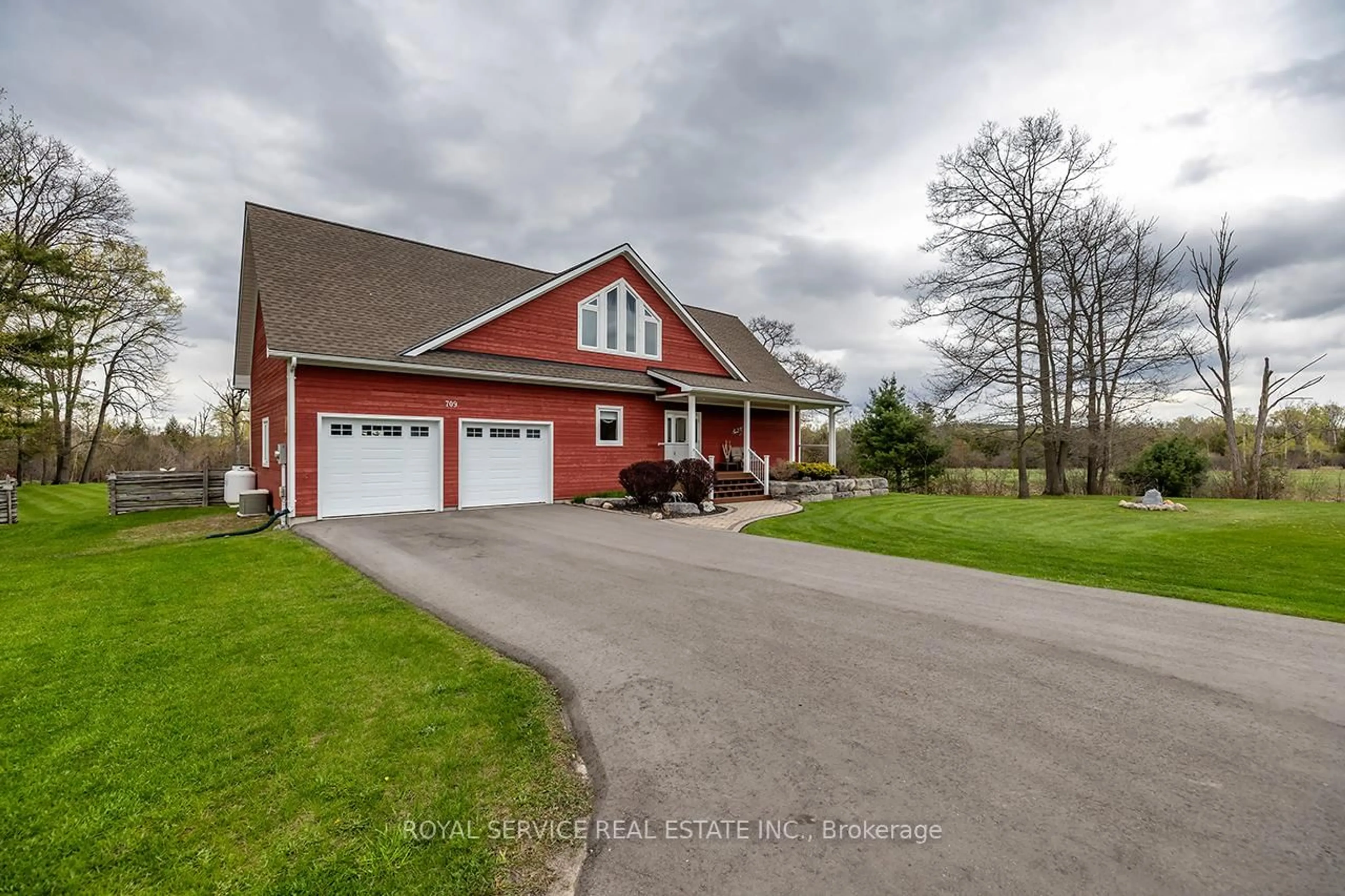 A pic from outside/outdoor area/front of a property/back of a property/a pic from drone, street for 709 Carveth Dr, Cavan Monaghan Ontario L0A 1G0