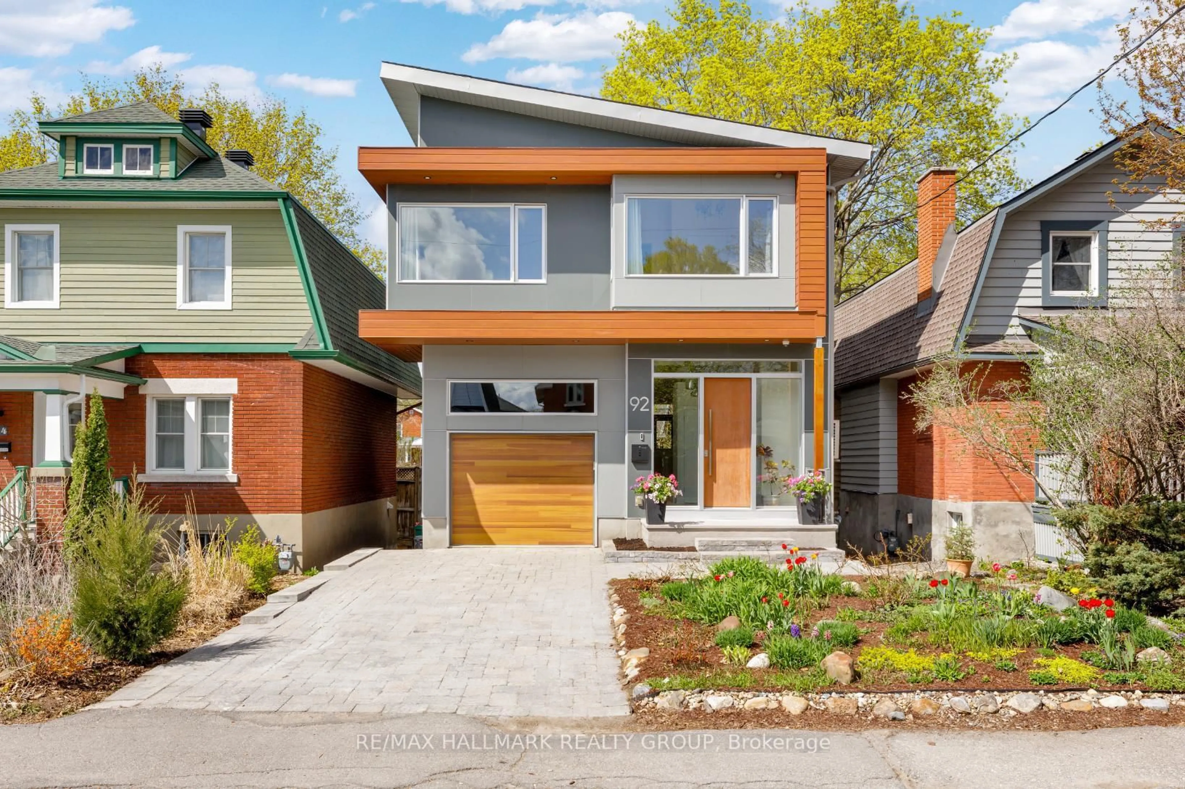 Home with brick exterior material, street for 92 Grange Ave, Ottawa Ontario K1Y 0N9
