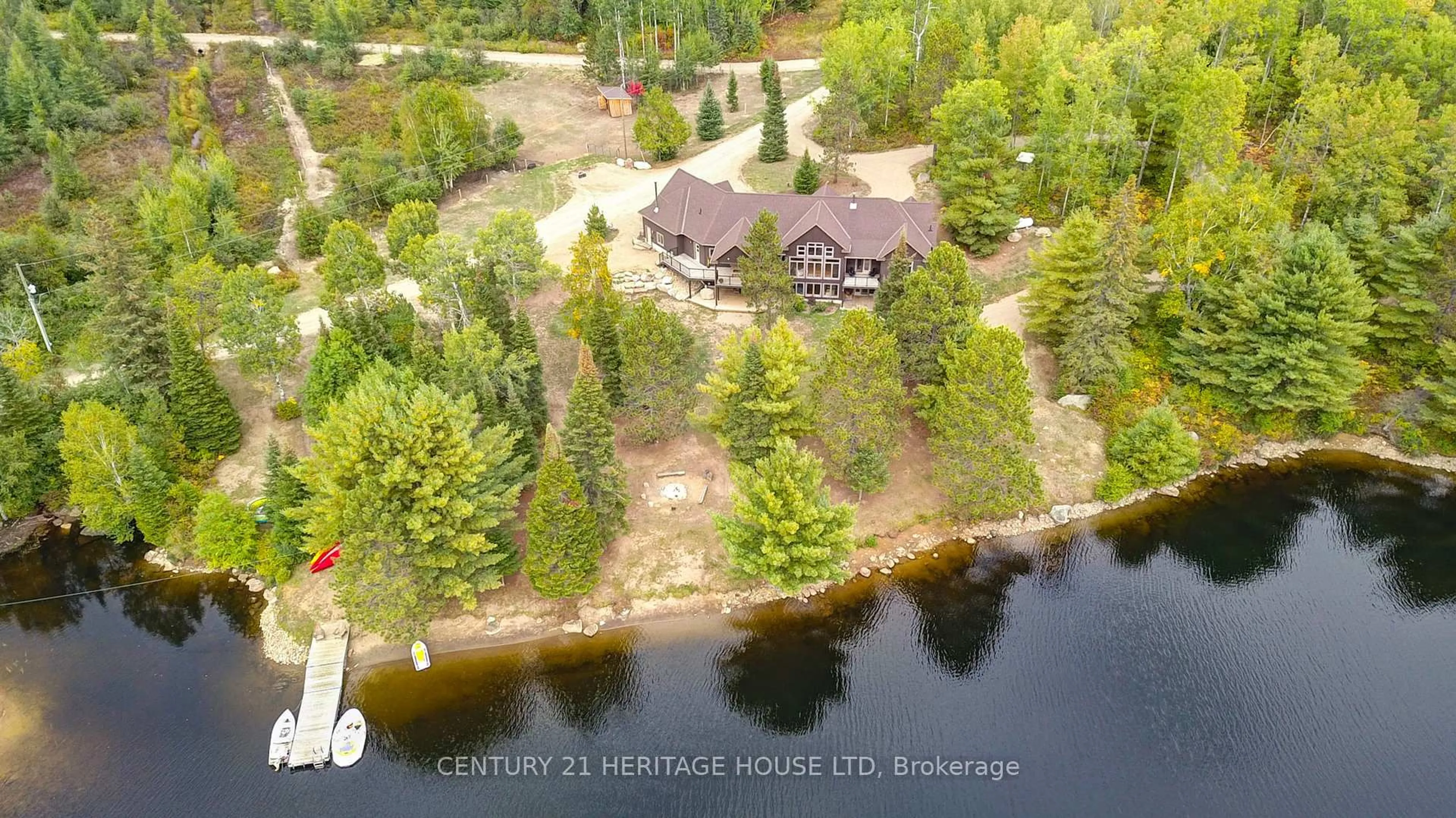 A pic from outside/outdoor area/front of a property/back of a property/a pic from drone, water/lake/river/ocean view for 6605 Highway 523 Highway, South Algonquin Ontario K0J 2C0