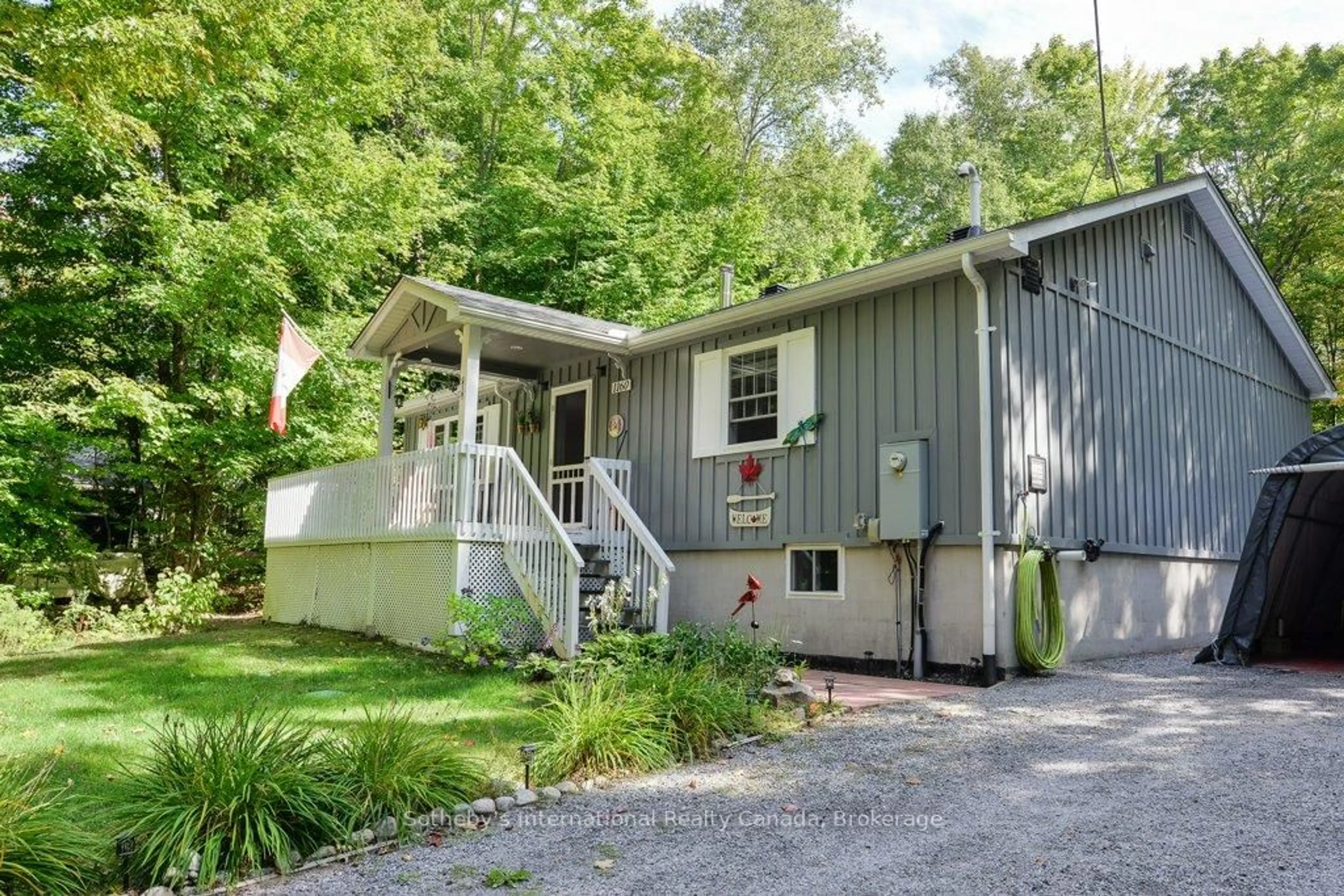 Home with vinyl exterior material, street for 1160 Skeleton Lake Rd 2 Rd, Muskoka Lakes Ontario P0B 1M0
