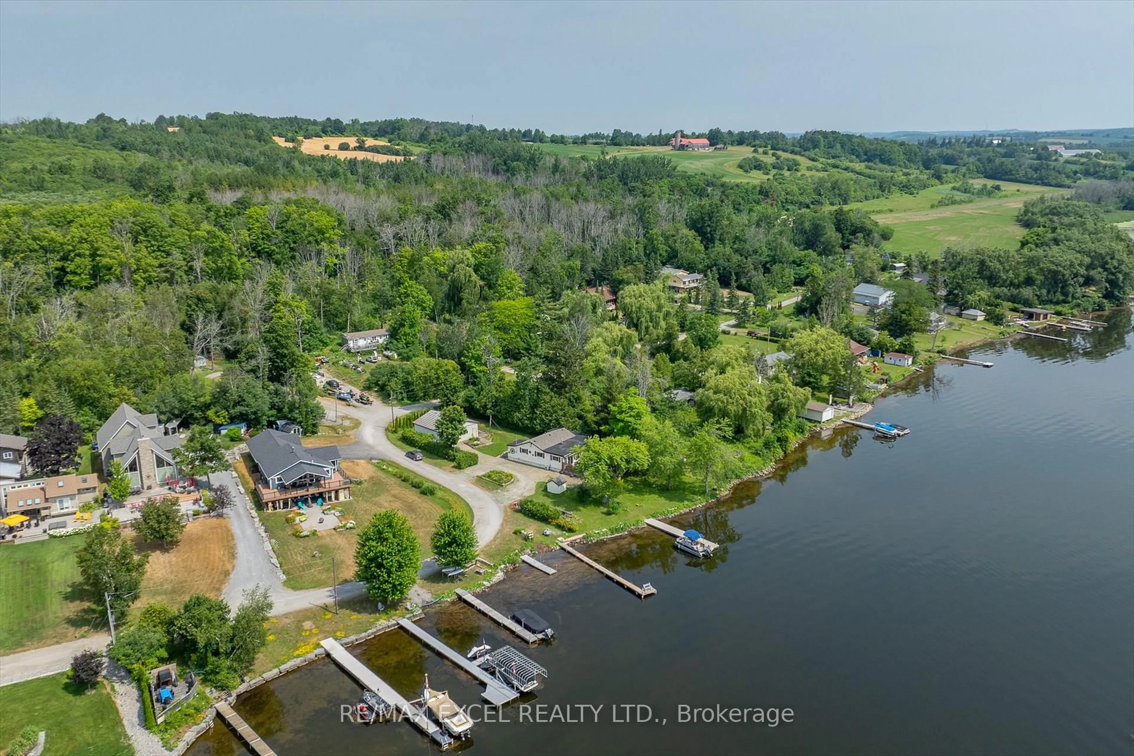 A pic from outside/outdoor area/front of a property/back of a property/a pic from drone, water/lake/river/ocean view for 665 North Shore Dr, Otonabee-South Monaghan Ontario P7B 6B3