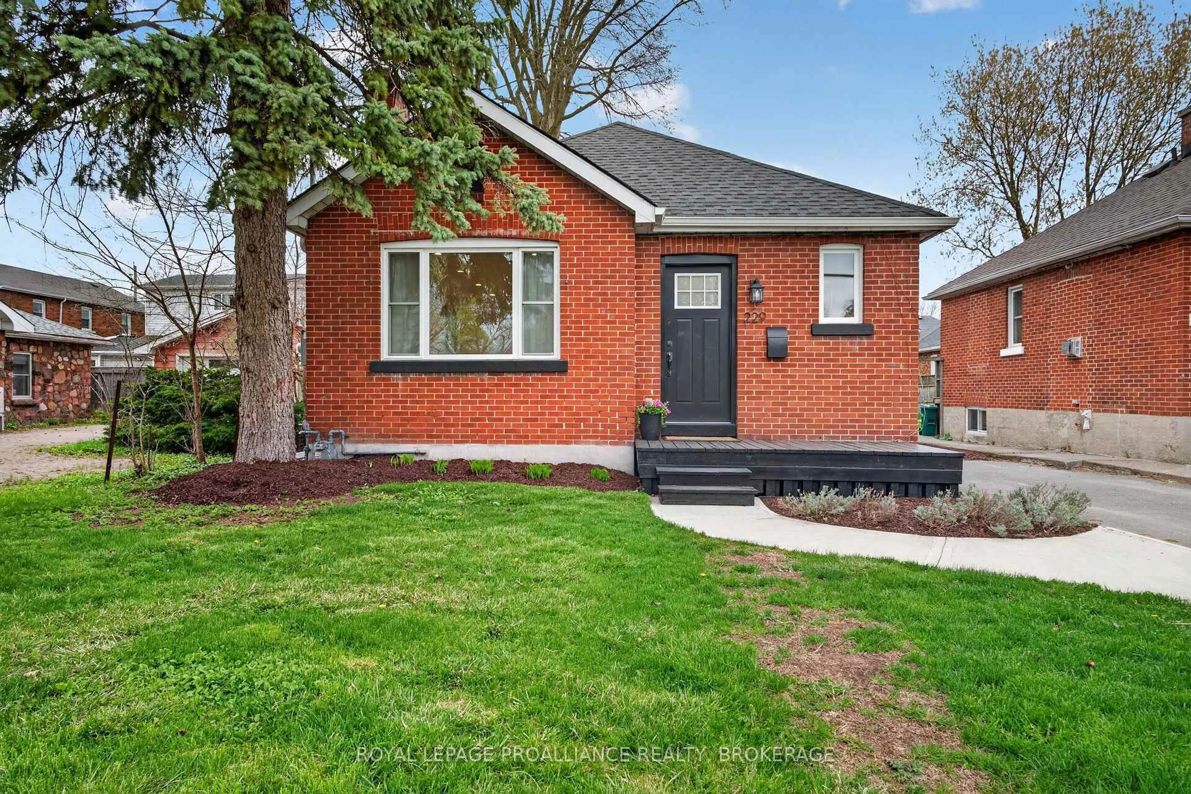 Home with brick exterior material, street for 229 Park St, Kingston Ontario K7L 1K4