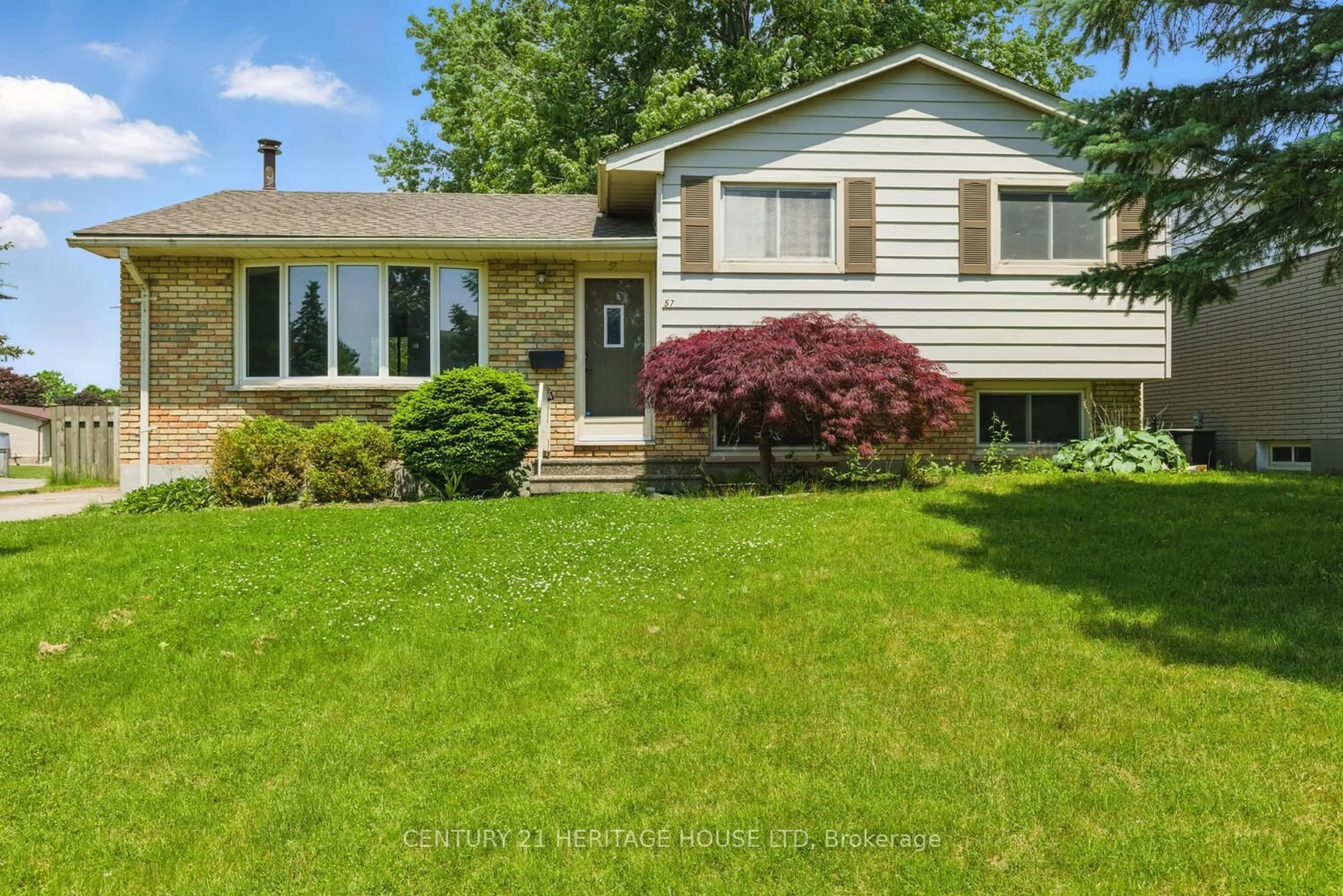 Home with vinyl exterior material, street for 57 VANBUSKIRK Dr, St. Thomas Ontario N5R 4Z3