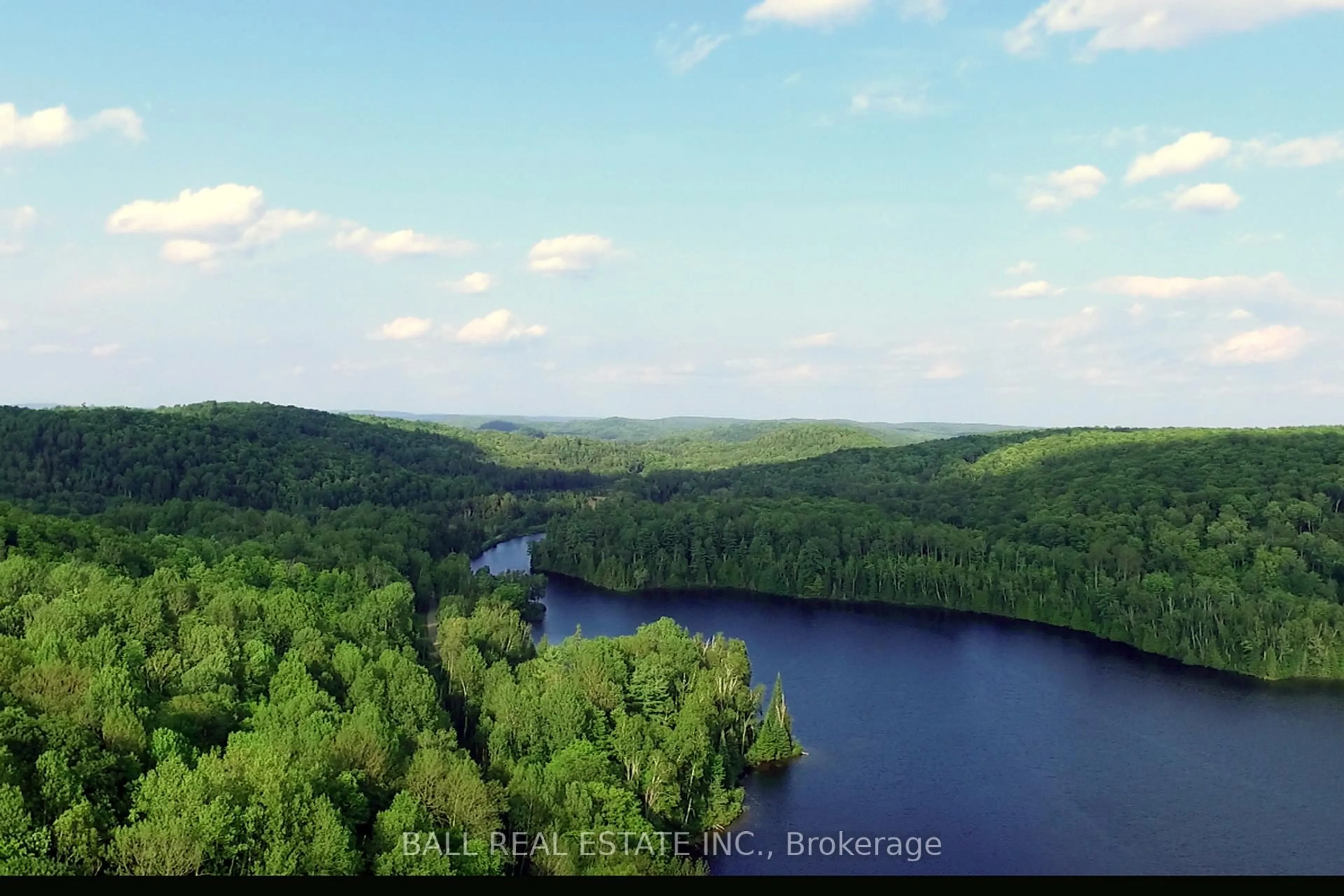 A pic from outside/outdoor area/front of a property/back of a property/a pic from drone, water/lake/river/ocean view for 1142 Cardiff Lake Rd, Highlands East Ontario K0L 3C0