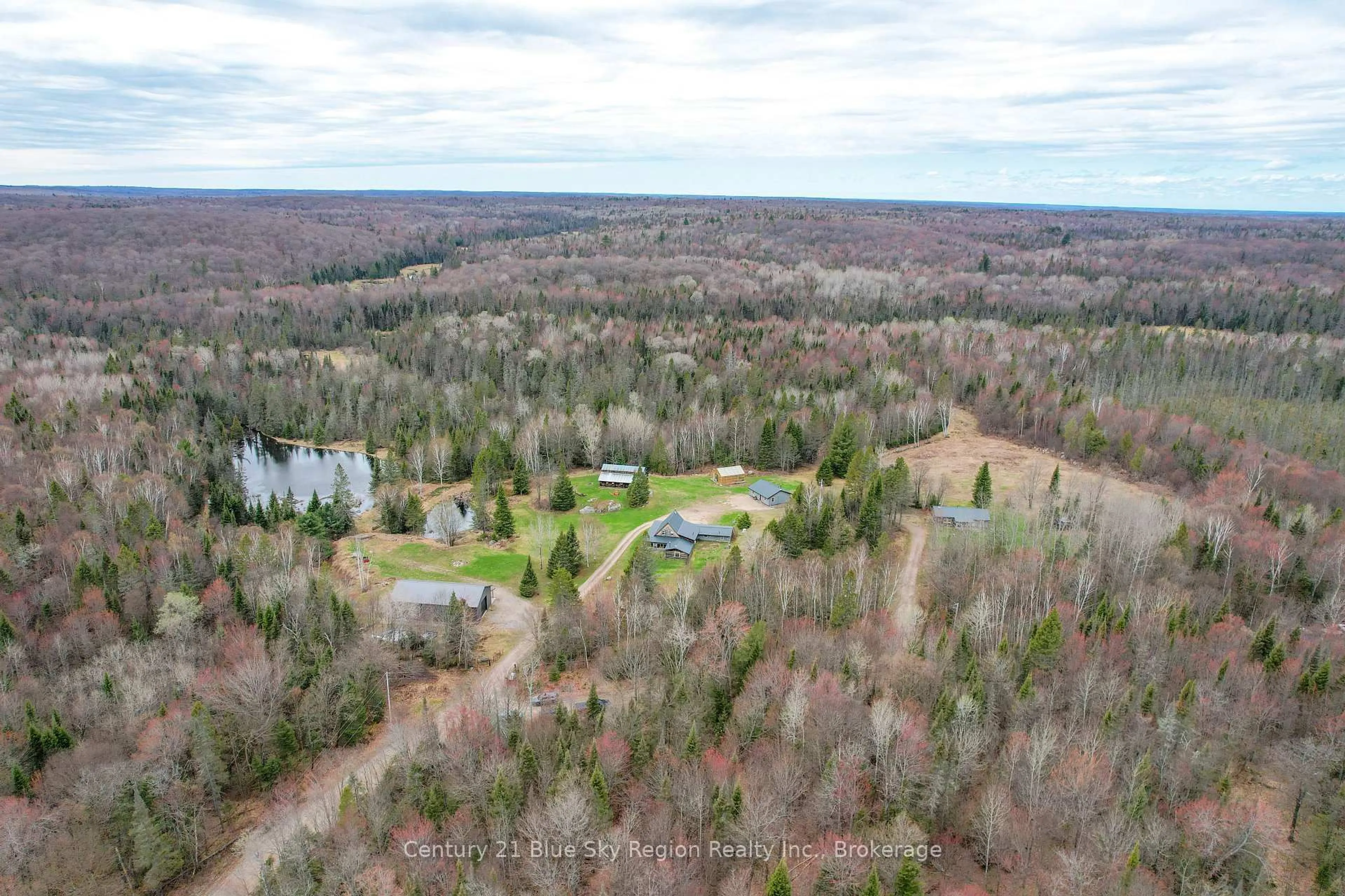 A pic from outside/outdoor area/front of a property/back of a property/a pic from drone, forest/trees view for 930 Ponderosa Rd, Nipissing Ontario P0H 2L0