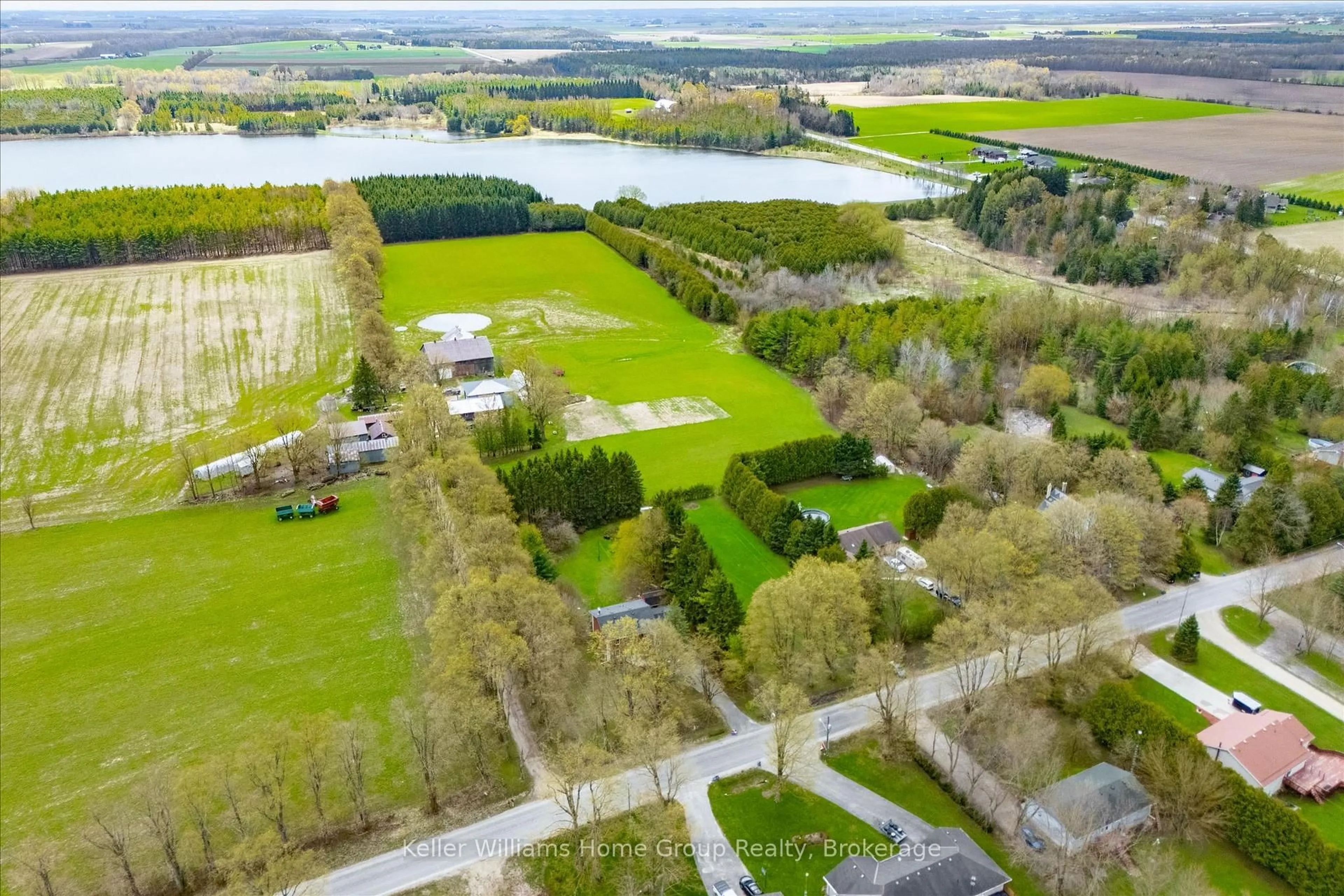 A pic from outside/outdoor area/front of a property/back of a property/a pic from drone, water/lake/river/ocean view for 8427 Line 6, Wellington North Ontario N0G 2E0