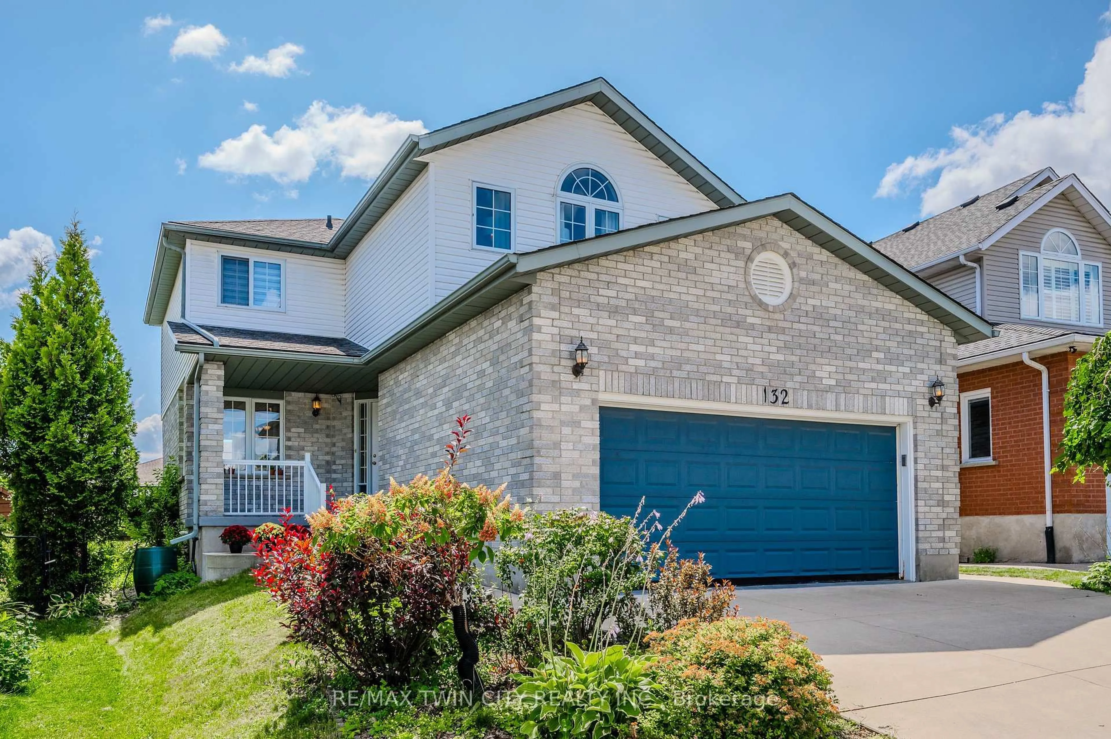 Home with brick exterior material, street for 132 Daimler Dr, Kitchener Ontario N2A 4C2