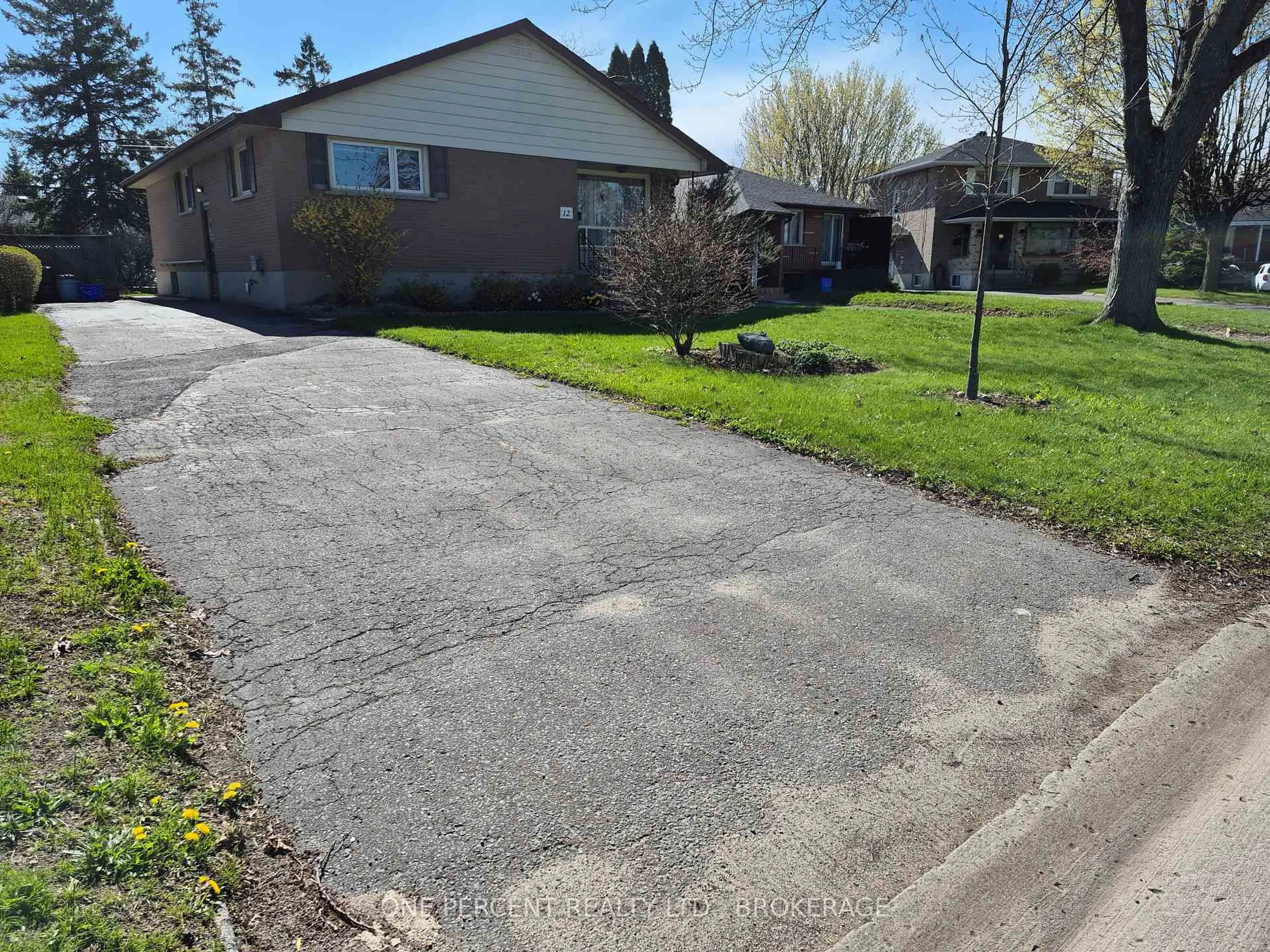 A pic from outside/outdoor area/front of a property/back of a property/a pic from drone, street for 12 Campbell Cres, Kingston Ontario K7M 1Z5