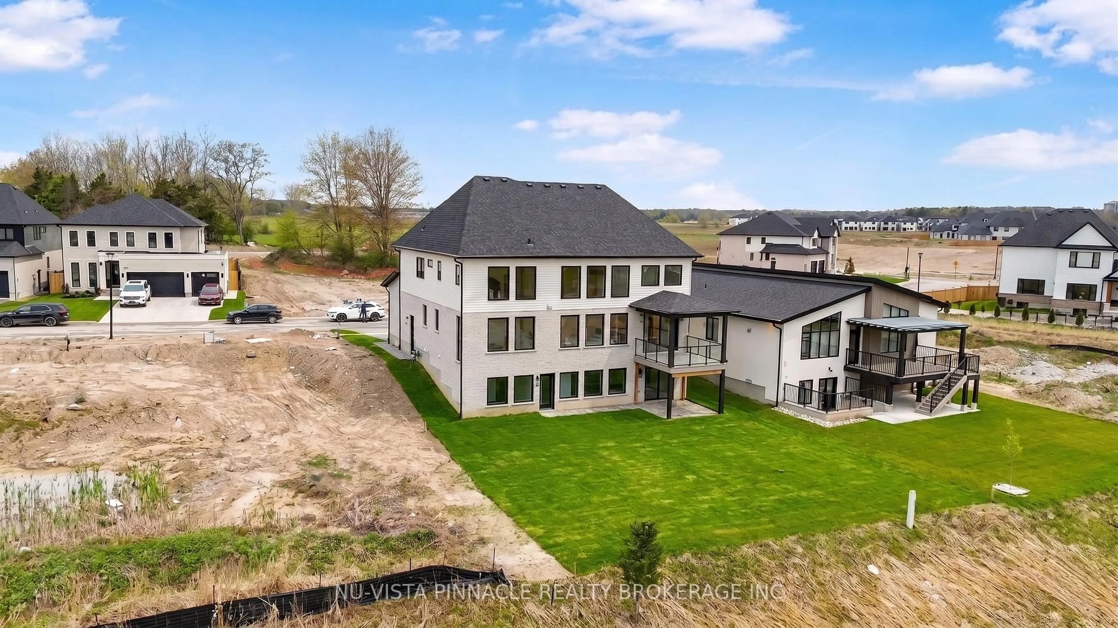 A pic from outside/outdoor area/front of a property/back of a property/a pic from drone, building for 4108 Fallingbrook Rd, London South Ontario N6P 1H5