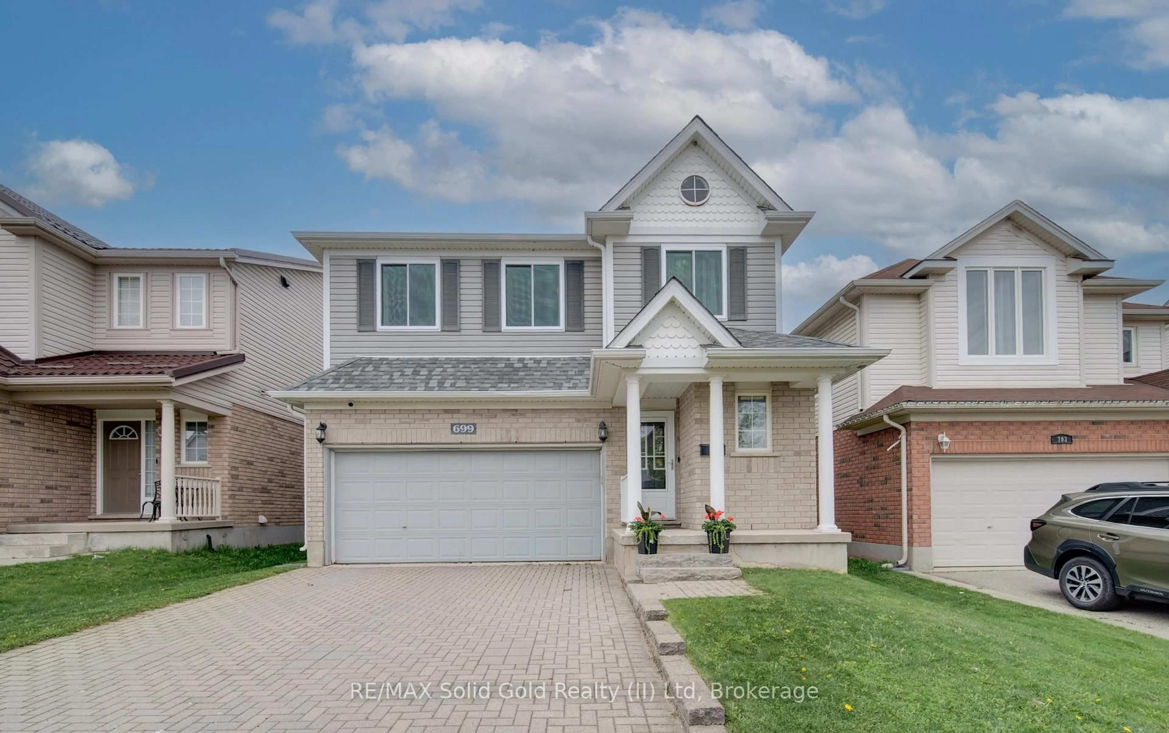 Home with brick exterior material, street for 699 Commonwealth Cres, Kitchener Ontario N2E 4J8
