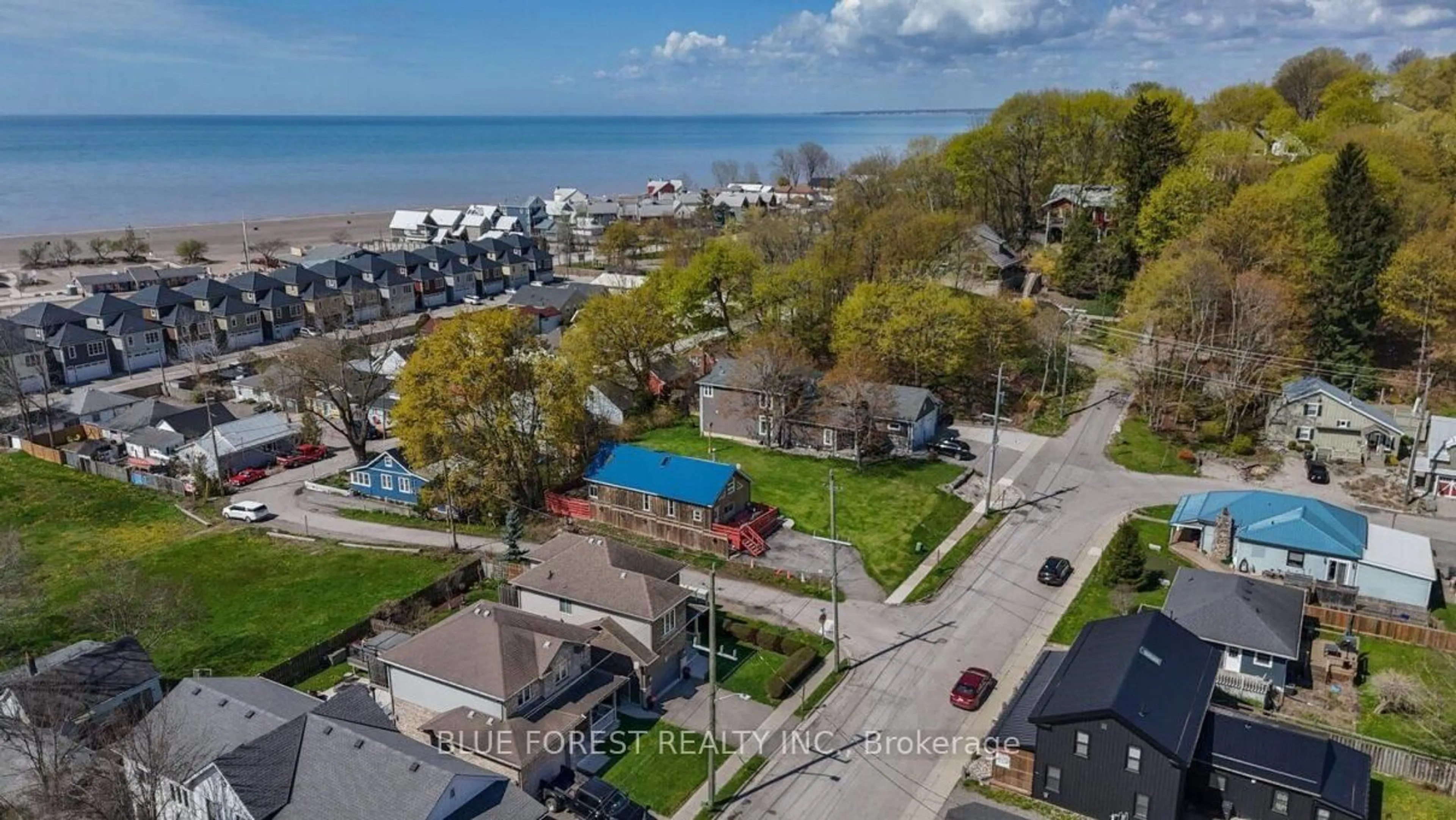 A pic from outside/outdoor area/front of a property/back of a property/a pic from drone, water/lake/river/ocean view for 332 Erie St, Central Elgin Ontario N5L 1E3