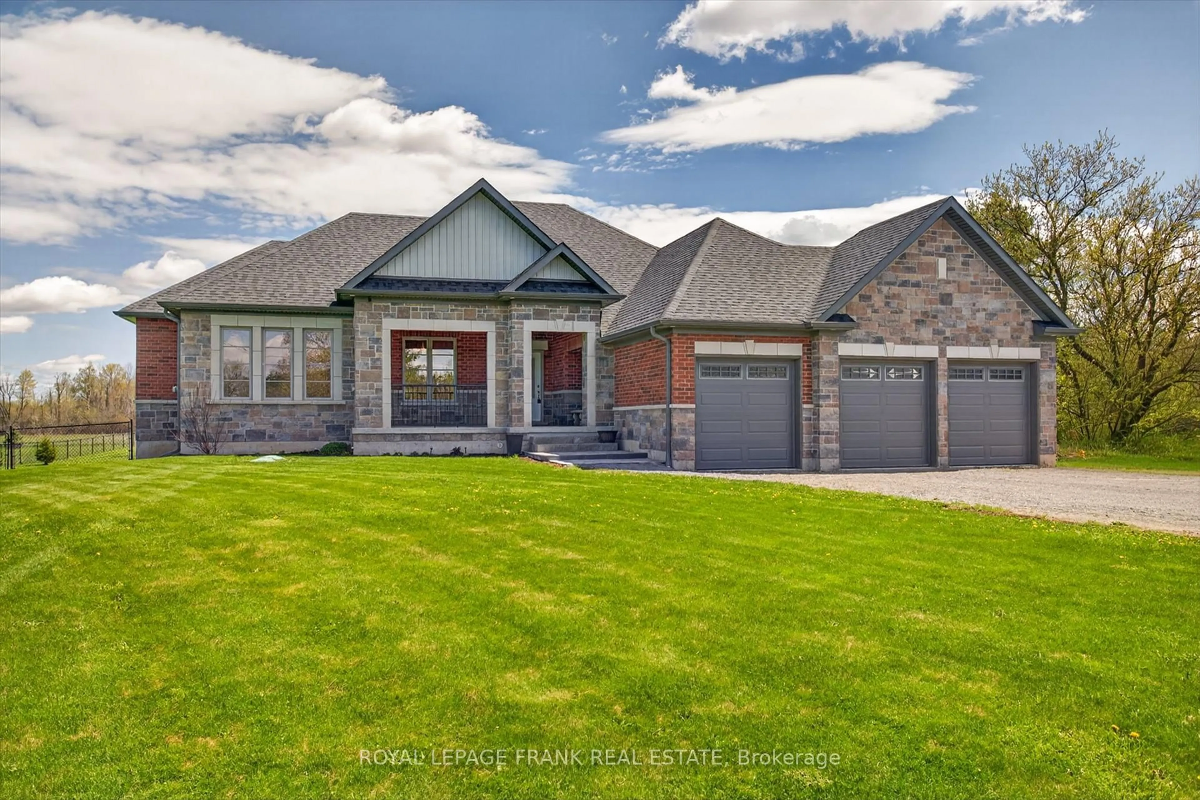 Home with brick exterior material, street for 1595 County Road 10, Cavan Monaghan Ontario L0A 1C0