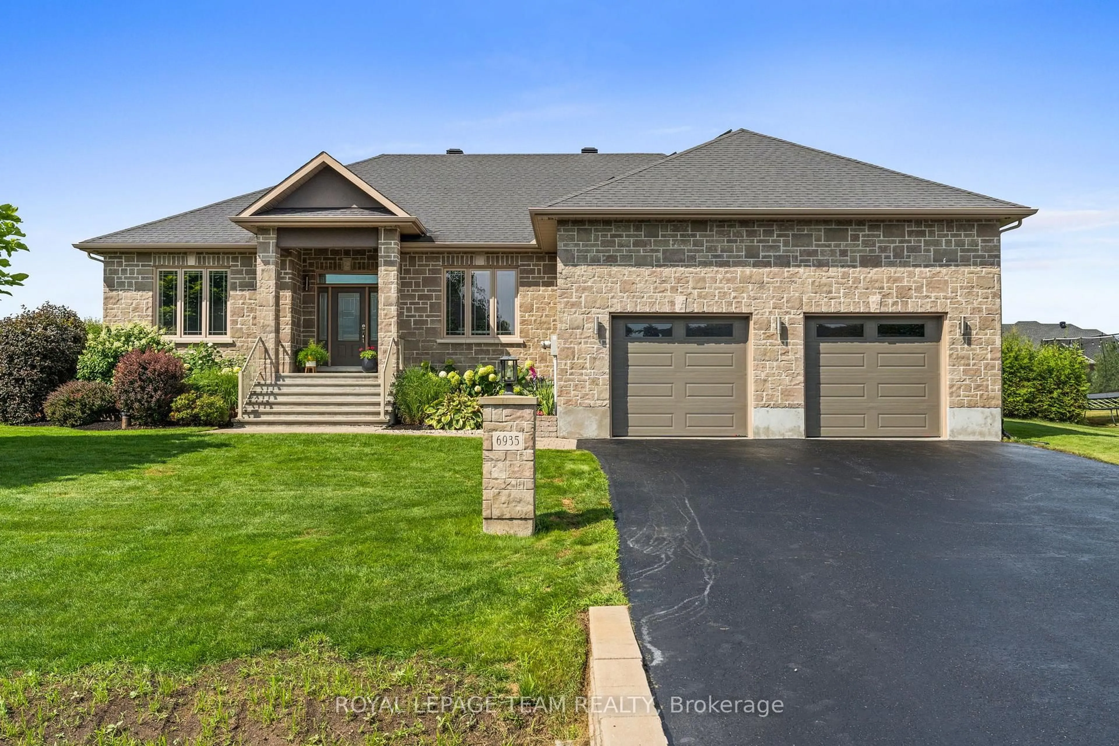 Home with brick exterior material, street for 6935 Still Meadow Way, Ottawa Ontario K4P 0C9