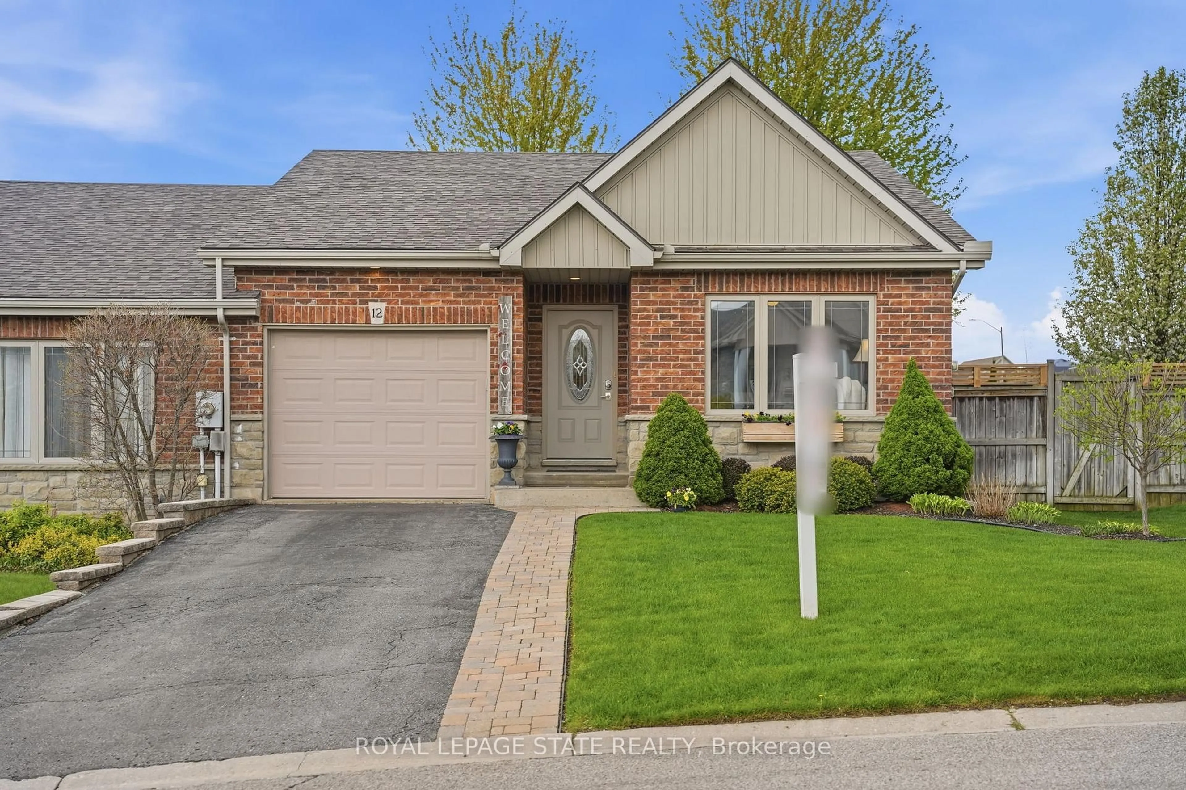 Home with brick exterior material, street for 12 Millcroft Dr, Norfolk Ontario N3Y 0A4