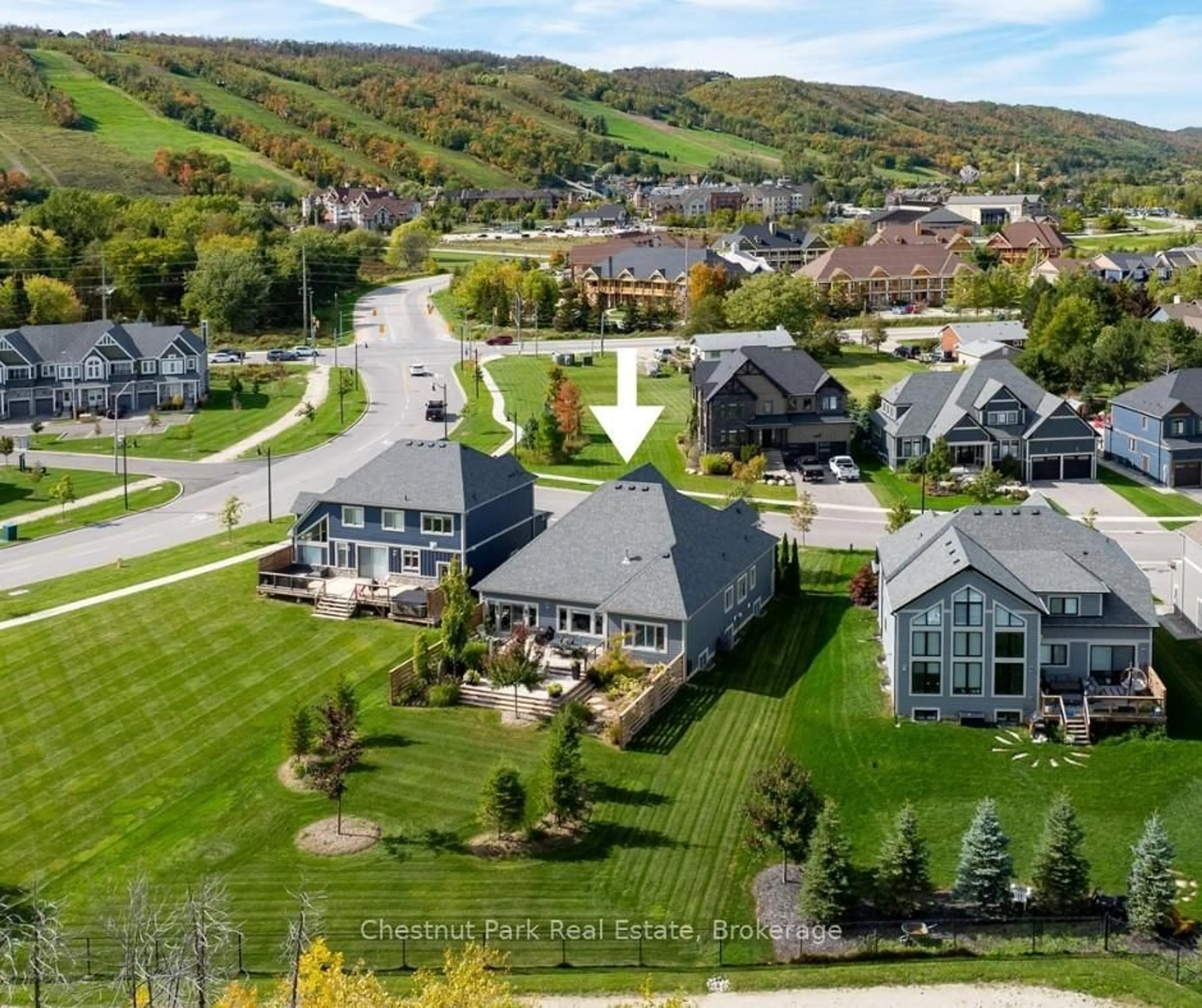 A pic from outside/outdoor area/front of a property/back of a property/a pic from drone, mountain view for 103 Creekwood Crt, Blue Mountains Ontario L9Y 0V1