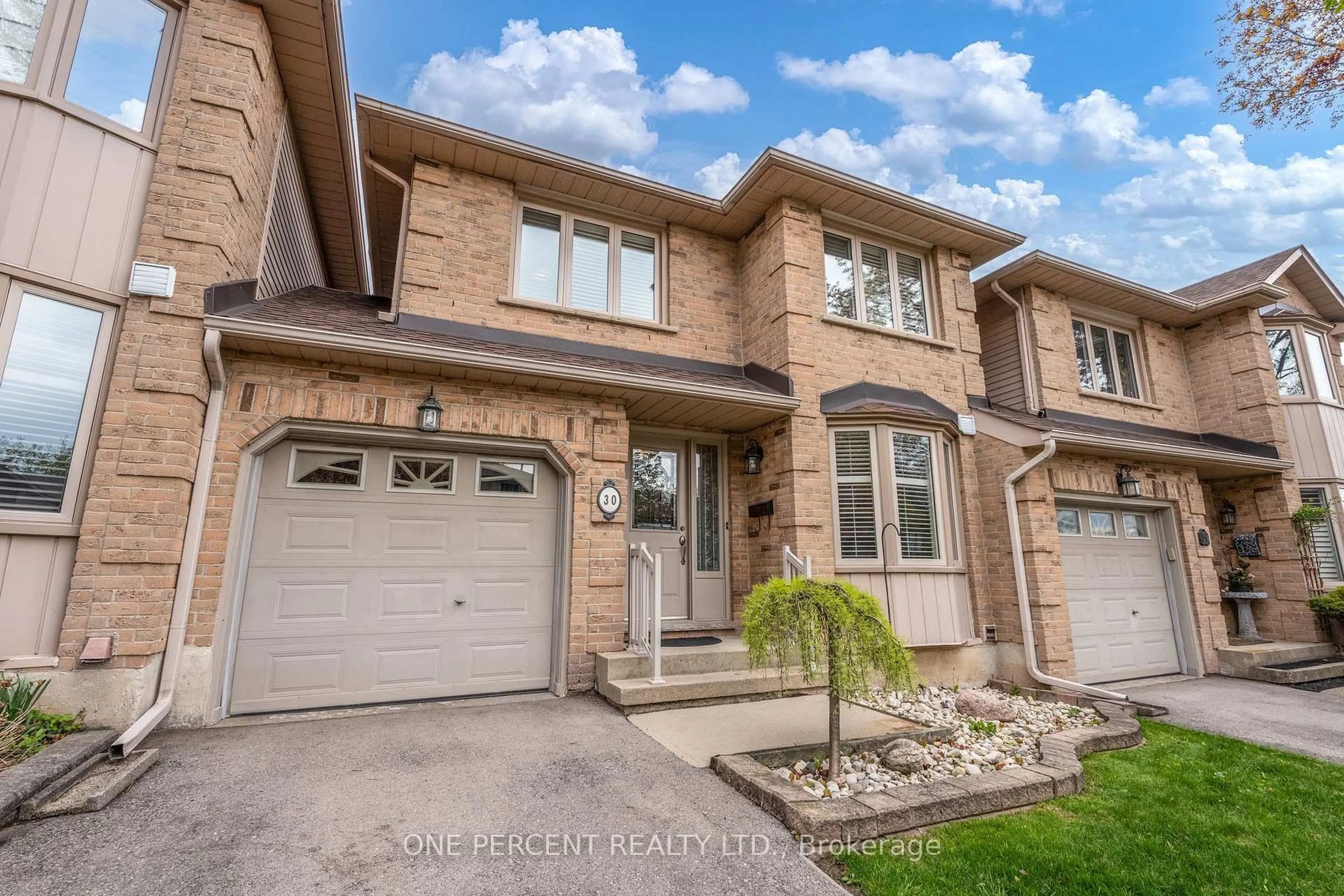 Home with brick exterior material, street for 800 Upper Paradise Rd #30, Hamilton Ontario L9C 7L2