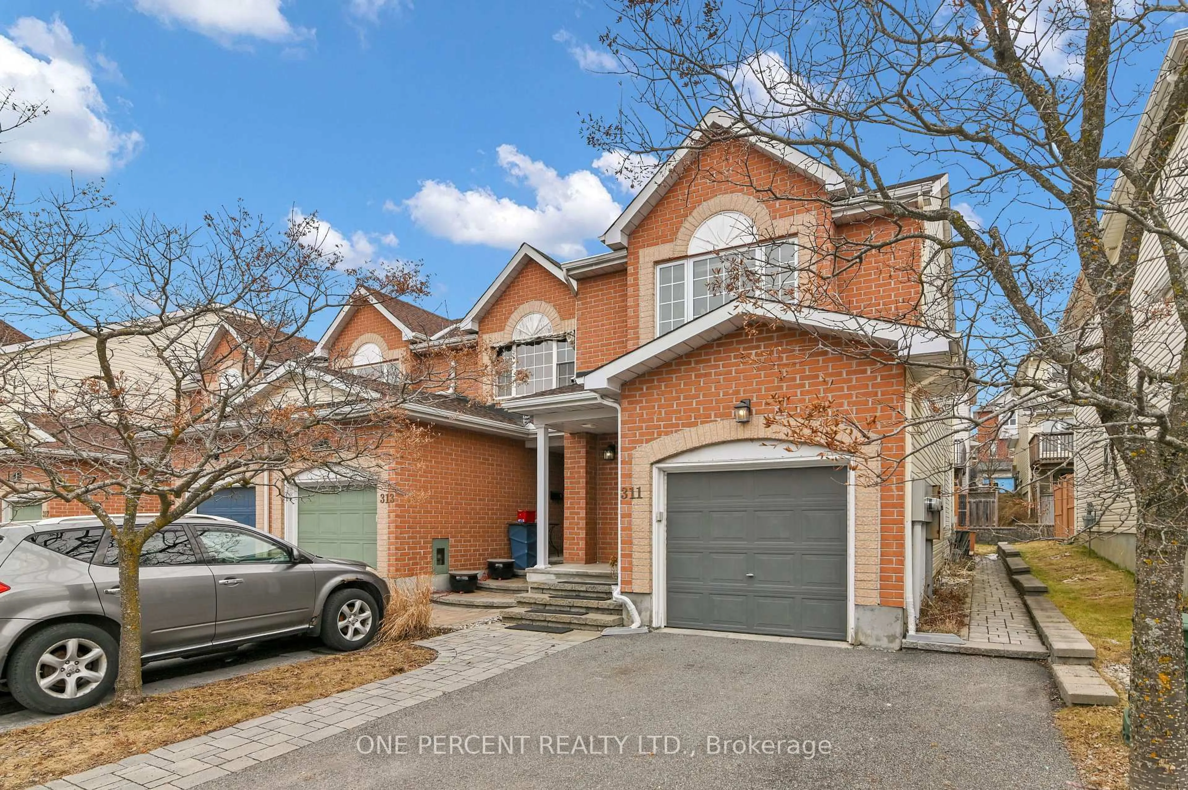 Home with brick exterior material, street for 311 Southcrest Private, Ottawa Ontario K1V 2B7