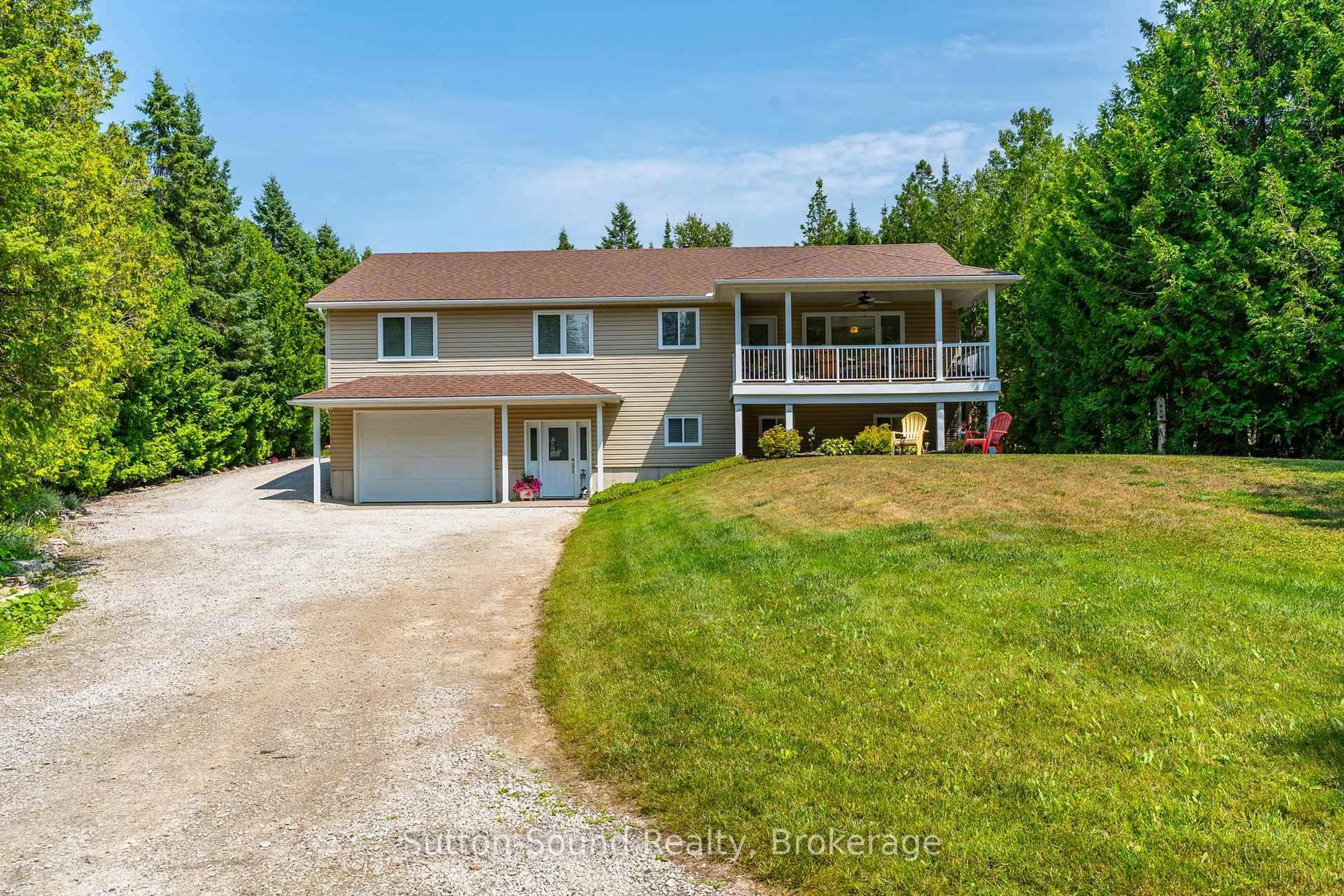 A pic from outside/outdoor area/front of a property/back of a property/a pic from drone, water/lake/river/ocean view for 1215 Sunset Dr, South Bruce Peninsula Ontario N0H 1X0