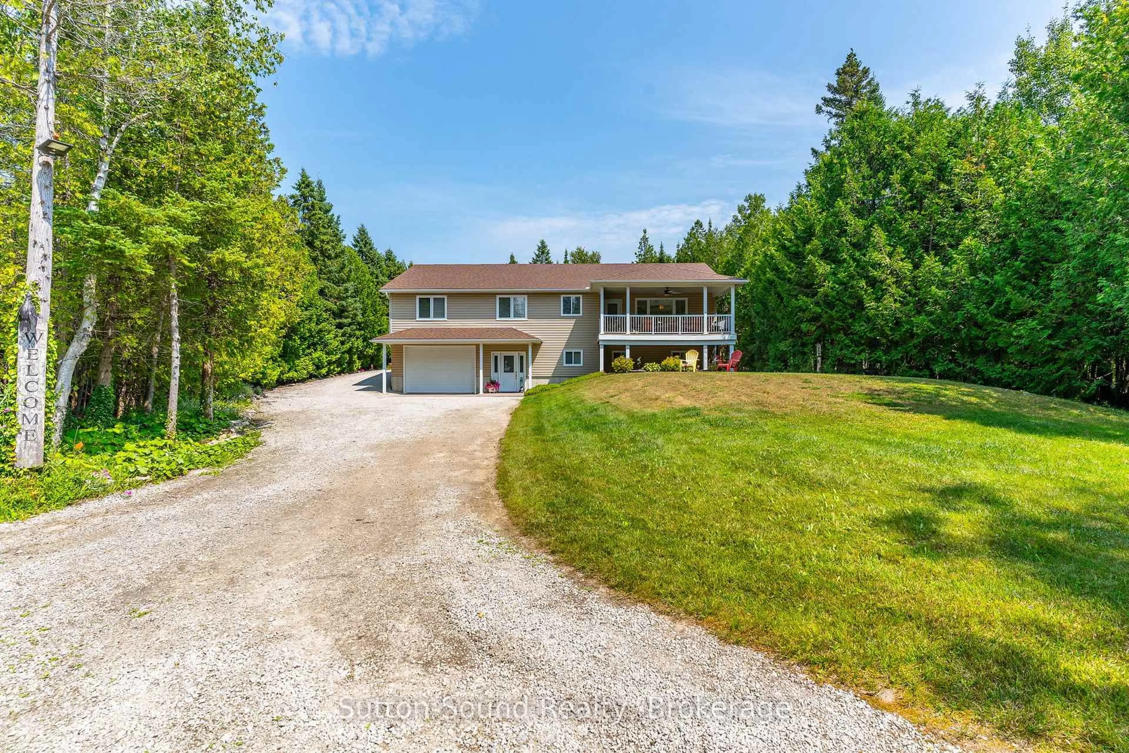 A pic from outside/outdoor area/front of a property/back of a property/a pic from drone, unknown for 1215 Sunset Dr, South Bruce Peninsula Ontario N0H 1X0