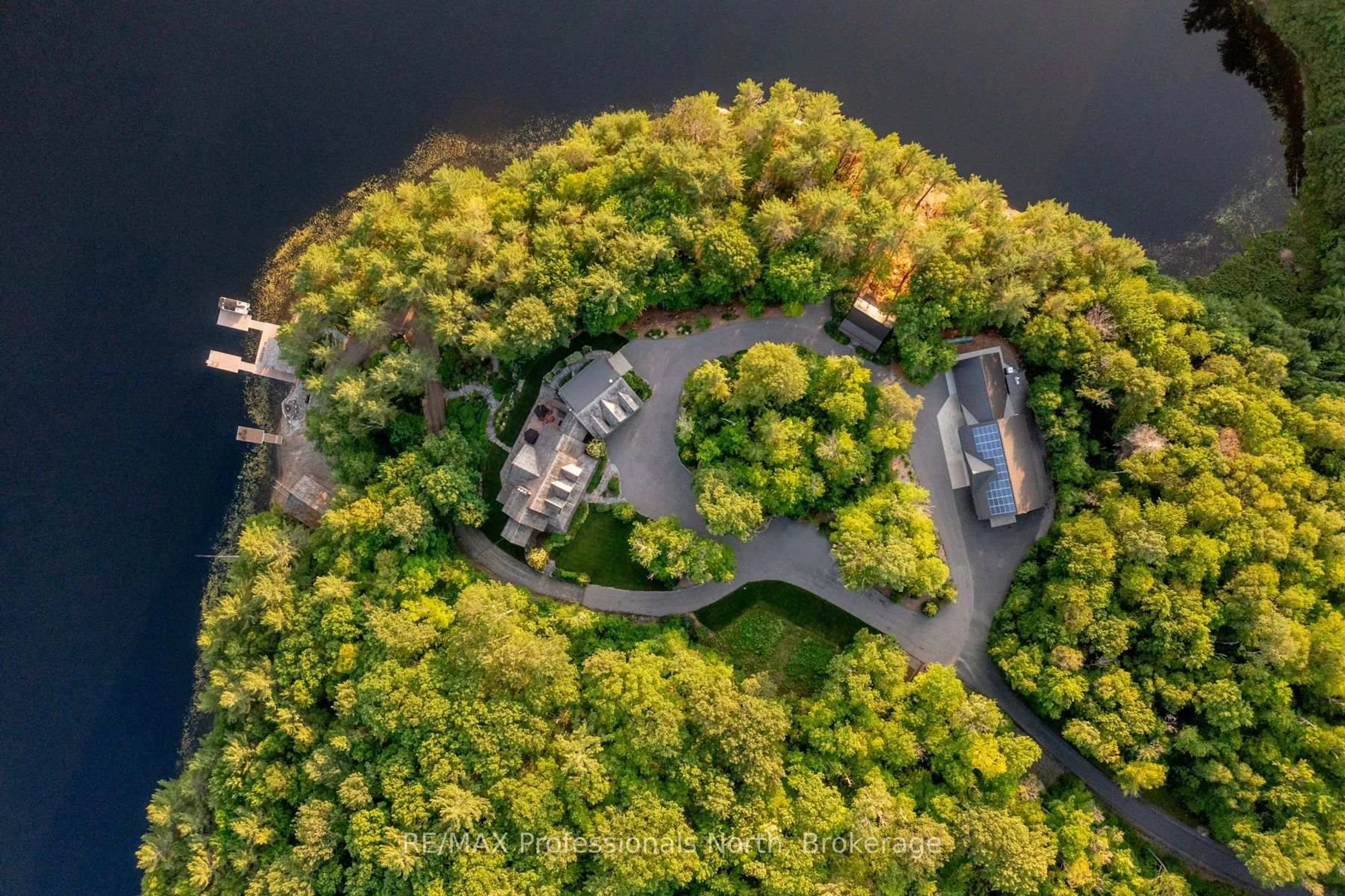 A pic from outside/outdoor area/front of a property/back of a property/a pic from drone, water/lake/river/ocean view for 1600 Misty Knoll Tr, Dysart et al Ontario K0M 1S0