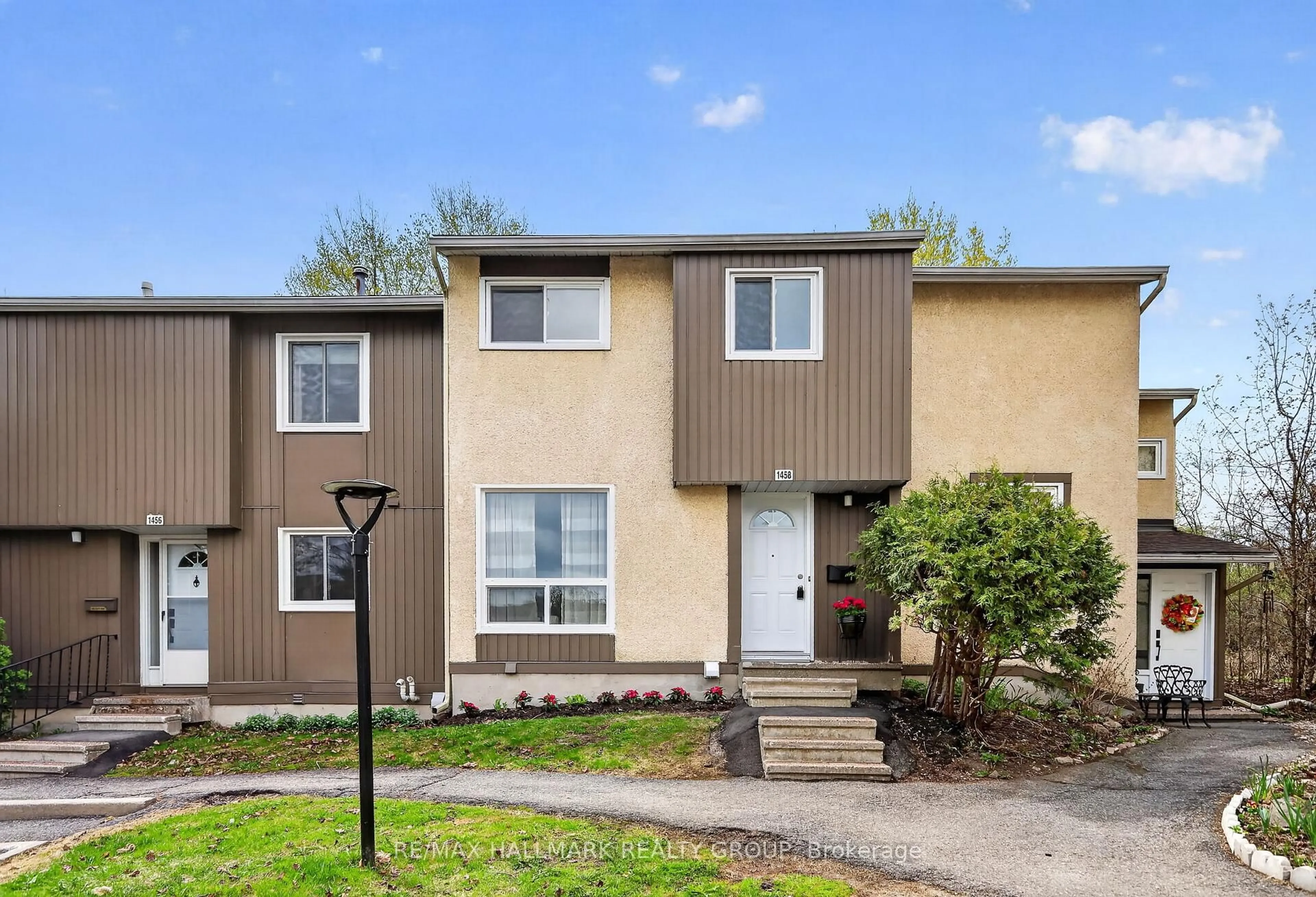 Home with vinyl exterior material, street for 1458 Lassiter Terr, Ottawa Ontario K1J 8N3