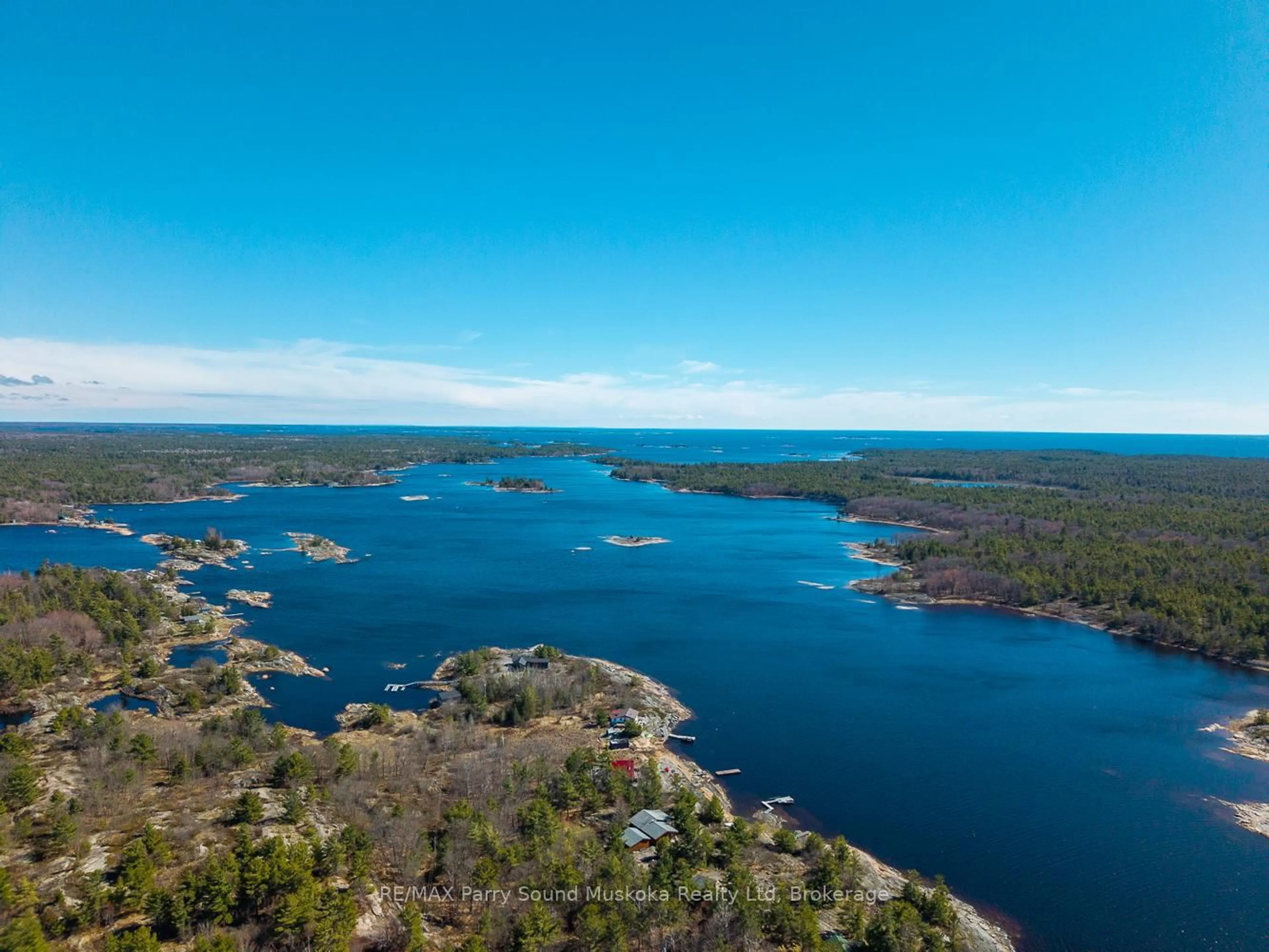 A pic from outside/outdoor area/front of a property/back of a property/a pic from drone, water/lake/river/ocean view for 16 Island 264c Island, Carling Ontario P0G 1G0