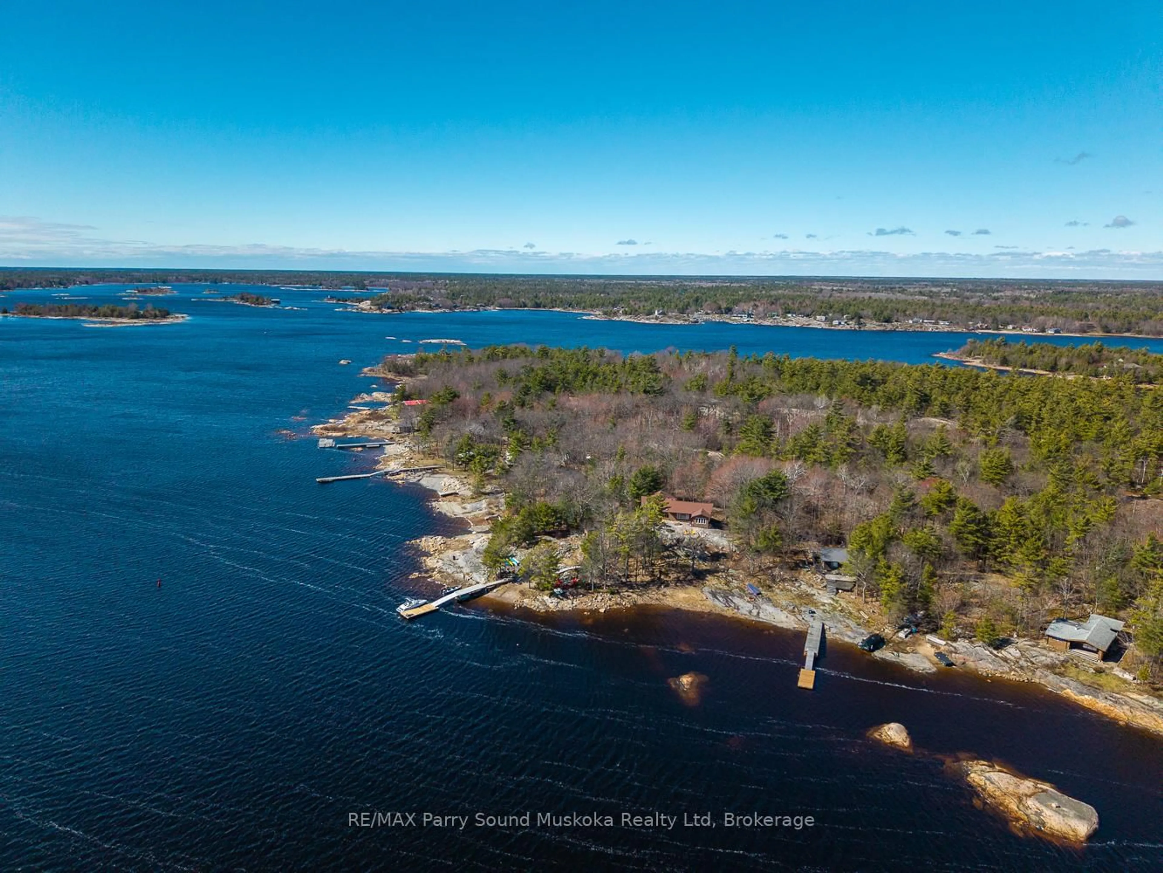 A pic from outside/outdoor area/front of a property/back of a property/a pic from drone, water/lake/river/ocean view for 16 Island 264c Island, Carling Ontario P0G 1G0