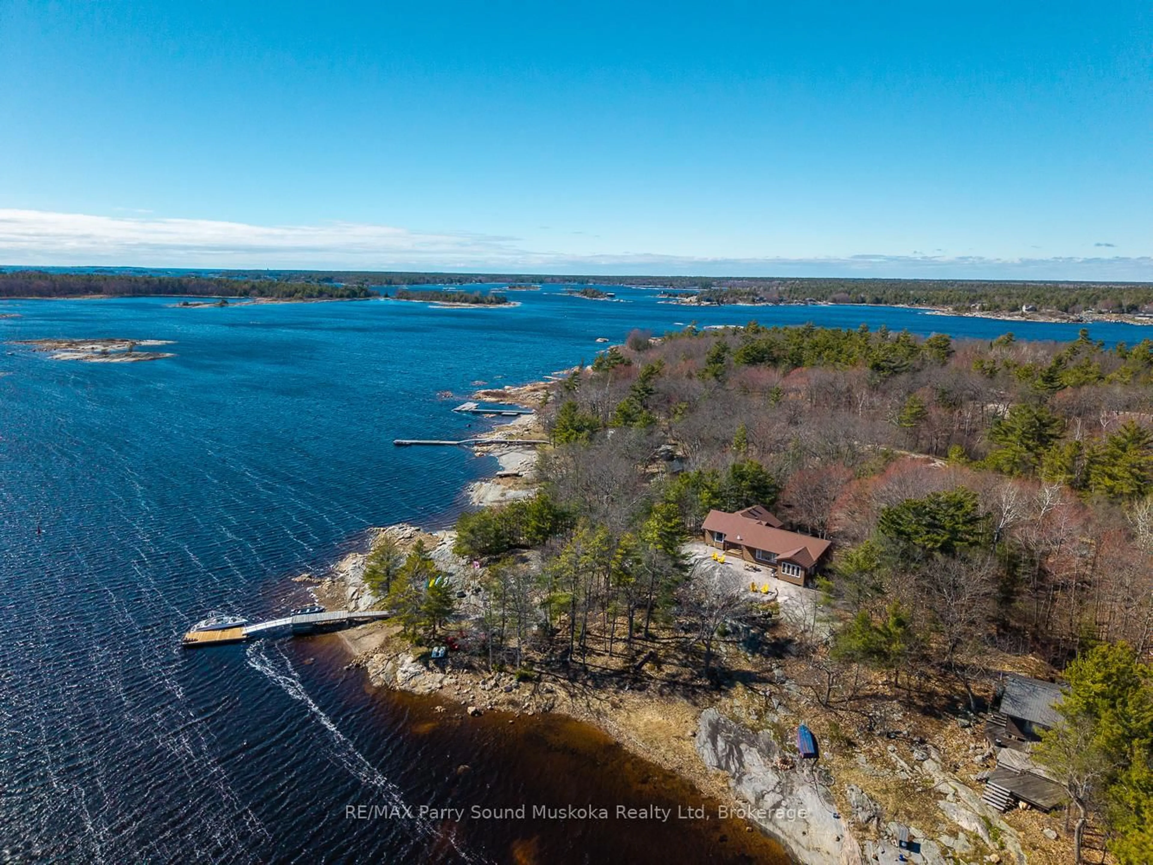 A pic from outside/outdoor area/front of a property/back of a property/a pic from drone, water/lake/river/ocean view for 16 Island 264c Island, Carling Ontario P0G 1G0