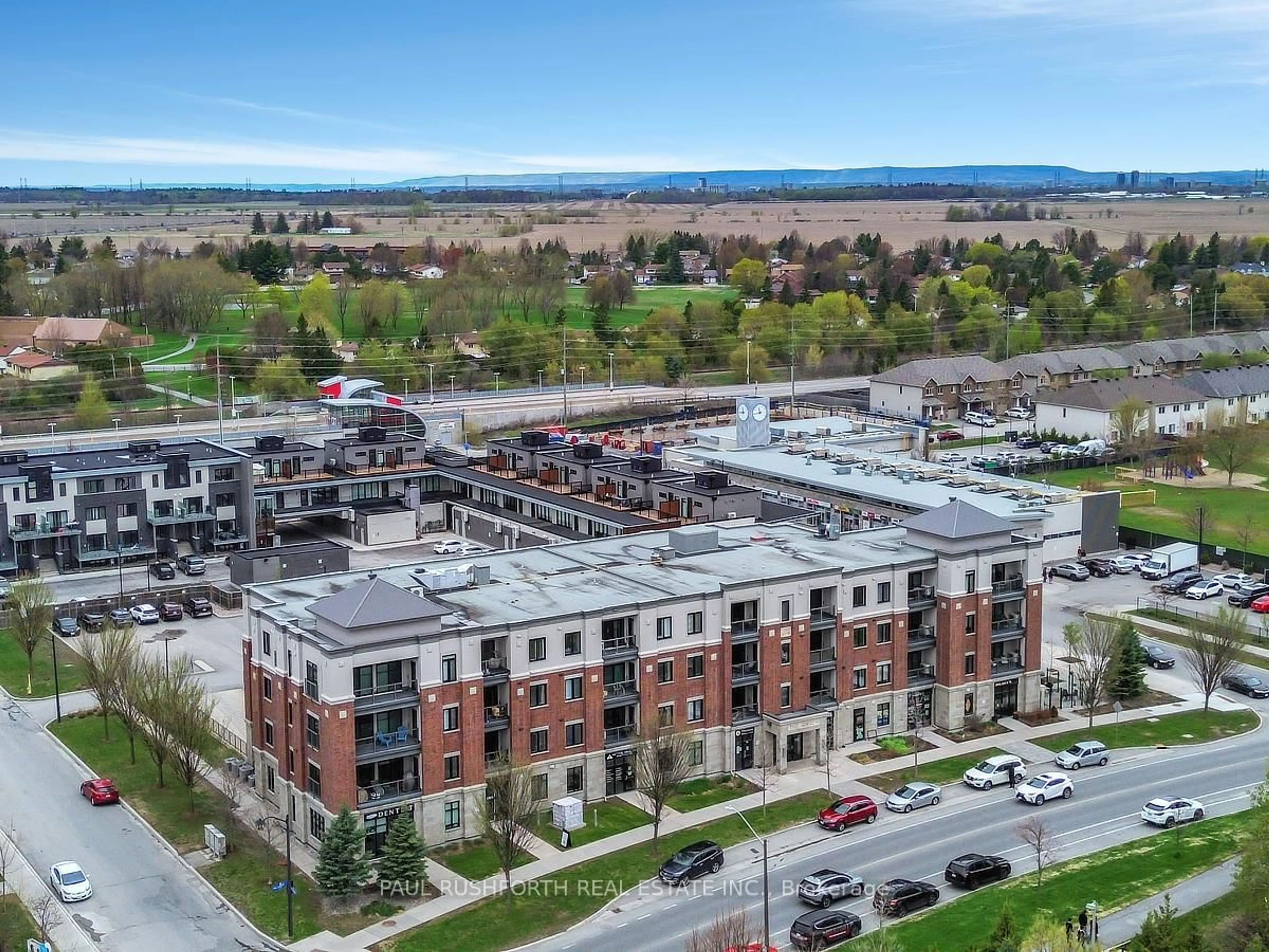 A pic from outside/outdoor area/front of a property/back of a property/a pic from drone, unknown for 615 Longfields Dr #410, Ottawa Ontario K2J 6J3