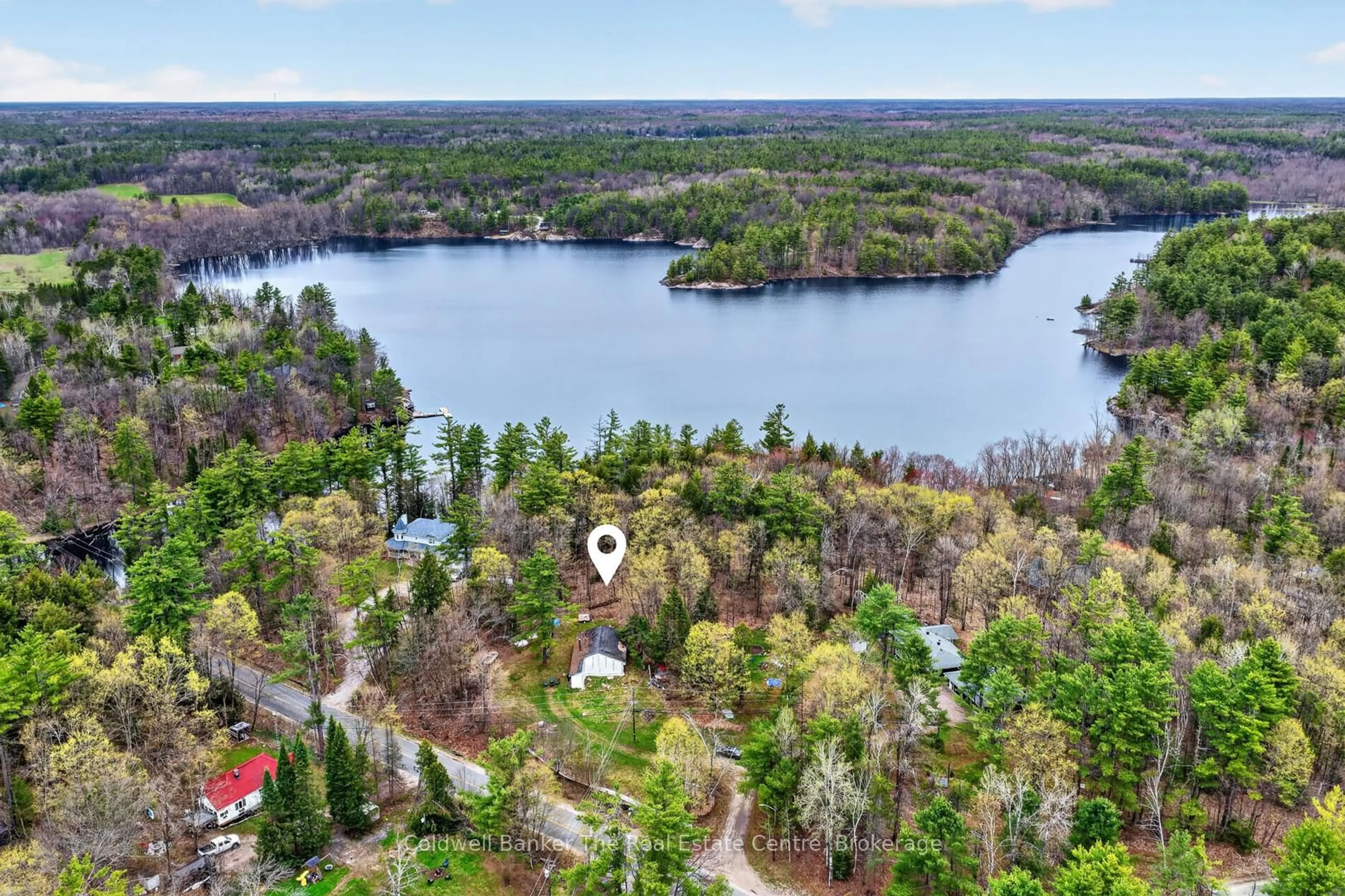 A pic from outside/outdoor area/front of a property/back of a property/a pic from drone, water/lake/river/ocean view for 1657 Houseys Rapids Rd, Gravenhurst Ontario P1P 1R3