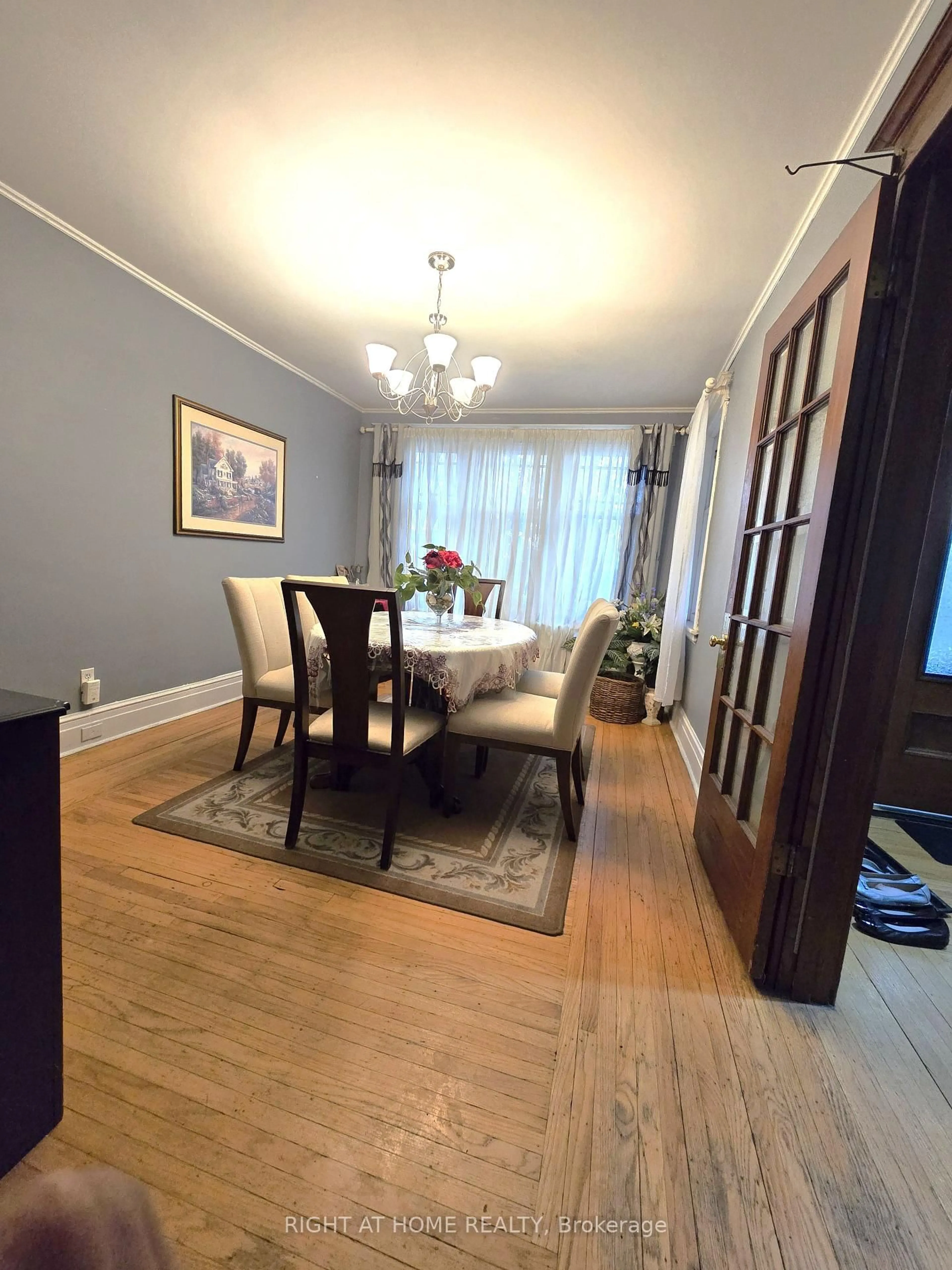 Dining room, wood/laminate floor for 1088 King St, Hamilton Ontario L8M 1E3