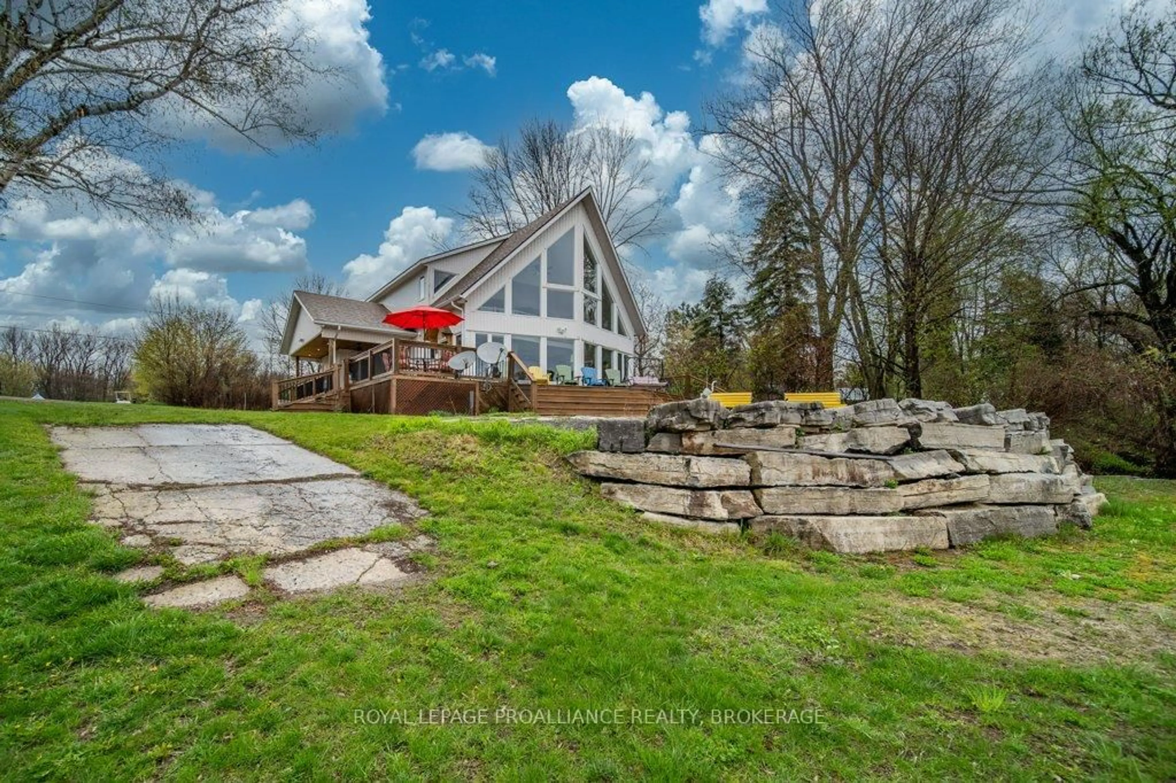 A pic from outside/outdoor area/front of a property/back of a property/a pic from drone, water/lake/river/ocean view for 243 Leone's Cove Lane, Wolfe Island Ontario K0H 2Y0