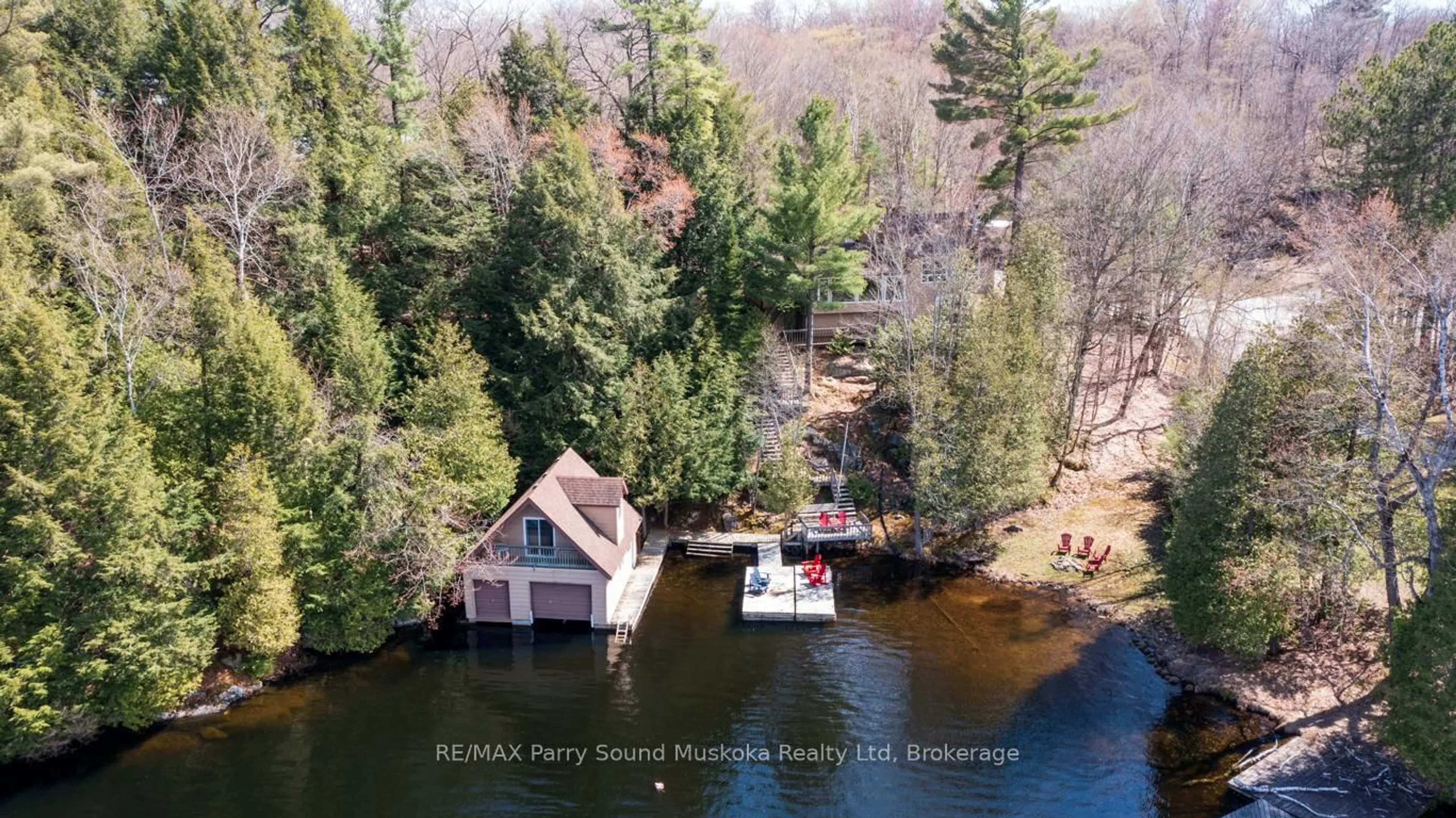 A pic from outside/outdoor area/front of a property/back of a property/a pic from drone, water/lake/river/ocean view for 17 Tapatoo Tr, Seguin Ontario P2A 0B2