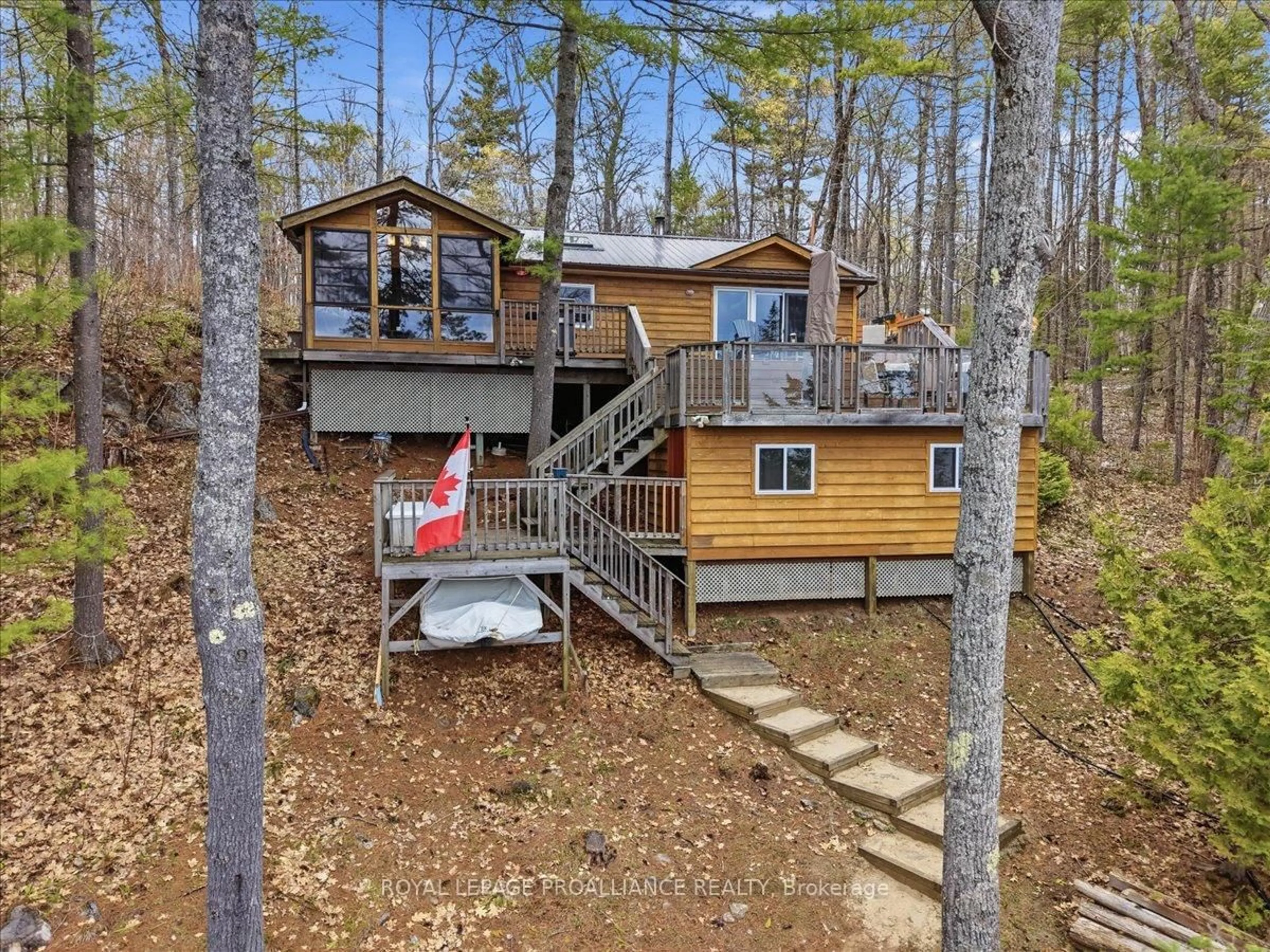 A pic from outside/outdoor area/front of a property/back of a property/a pic from drone, forest/trees view for 2069 Browns Bay Lane, Cloyne Ontario K0H 1K0