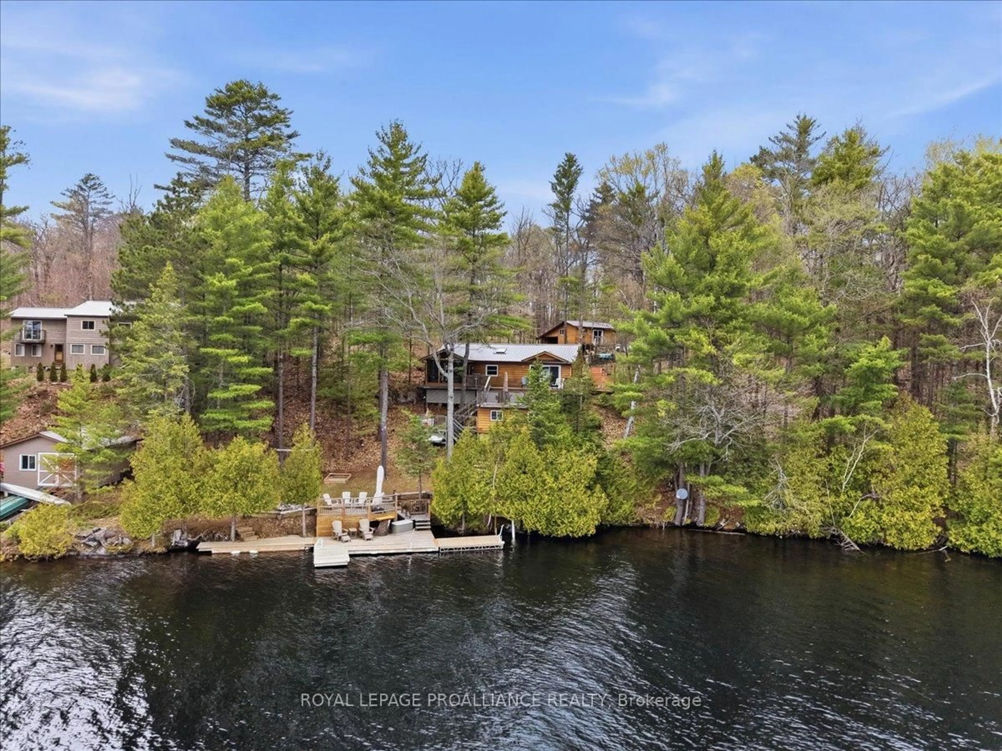 A pic from outside/outdoor area/front of a property/back of a property/a pic from drone, water/lake/river/ocean view for 2069 Browns Bay Lane, Cloyne Ontario K0H 1K0