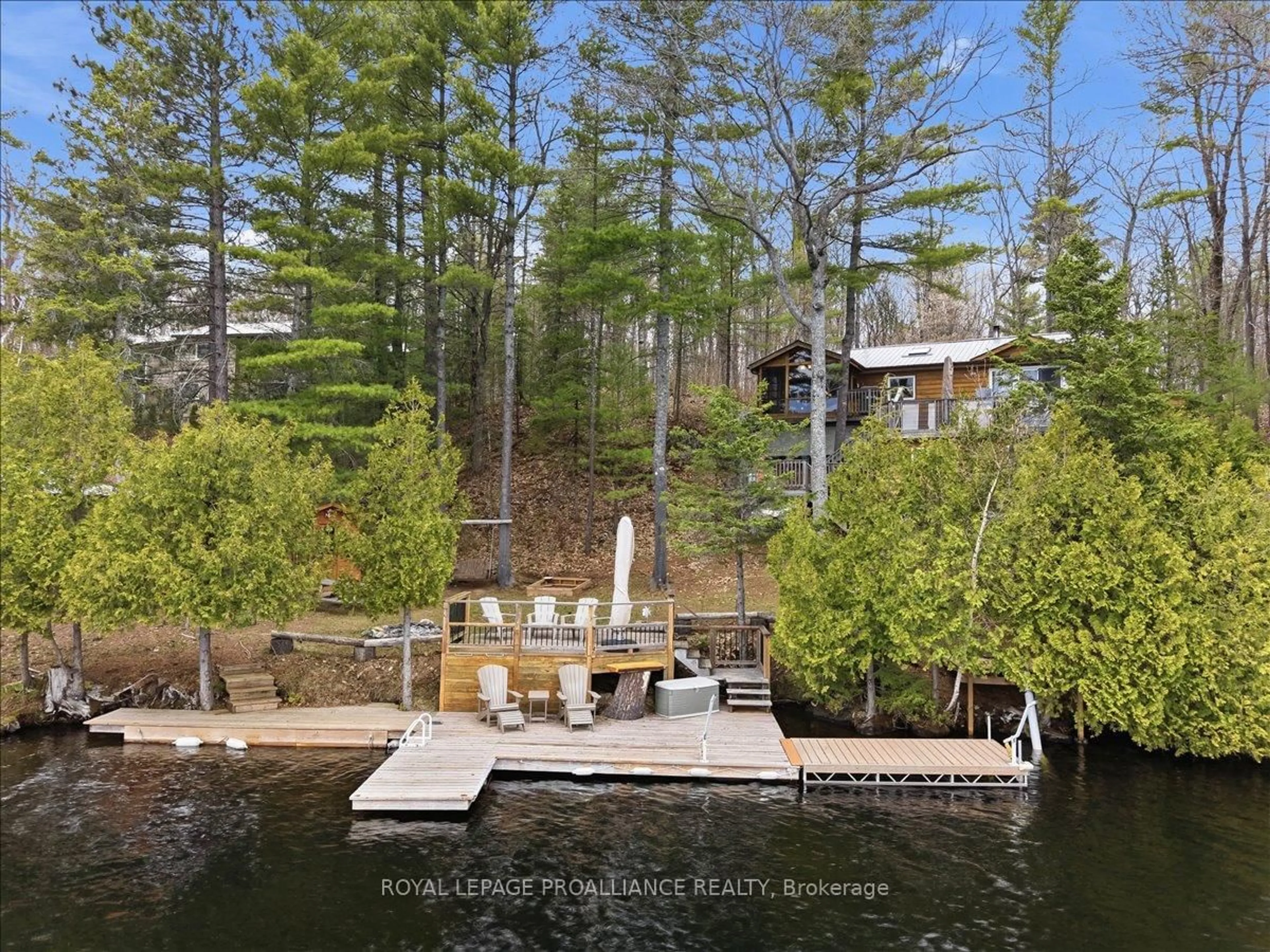 A pic from outside/outdoor area/front of a property/back of a property/a pic from drone, water/lake/river/ocean view for 2069 Browns Bay Lane, Cloyne Ontario K0H 1K0