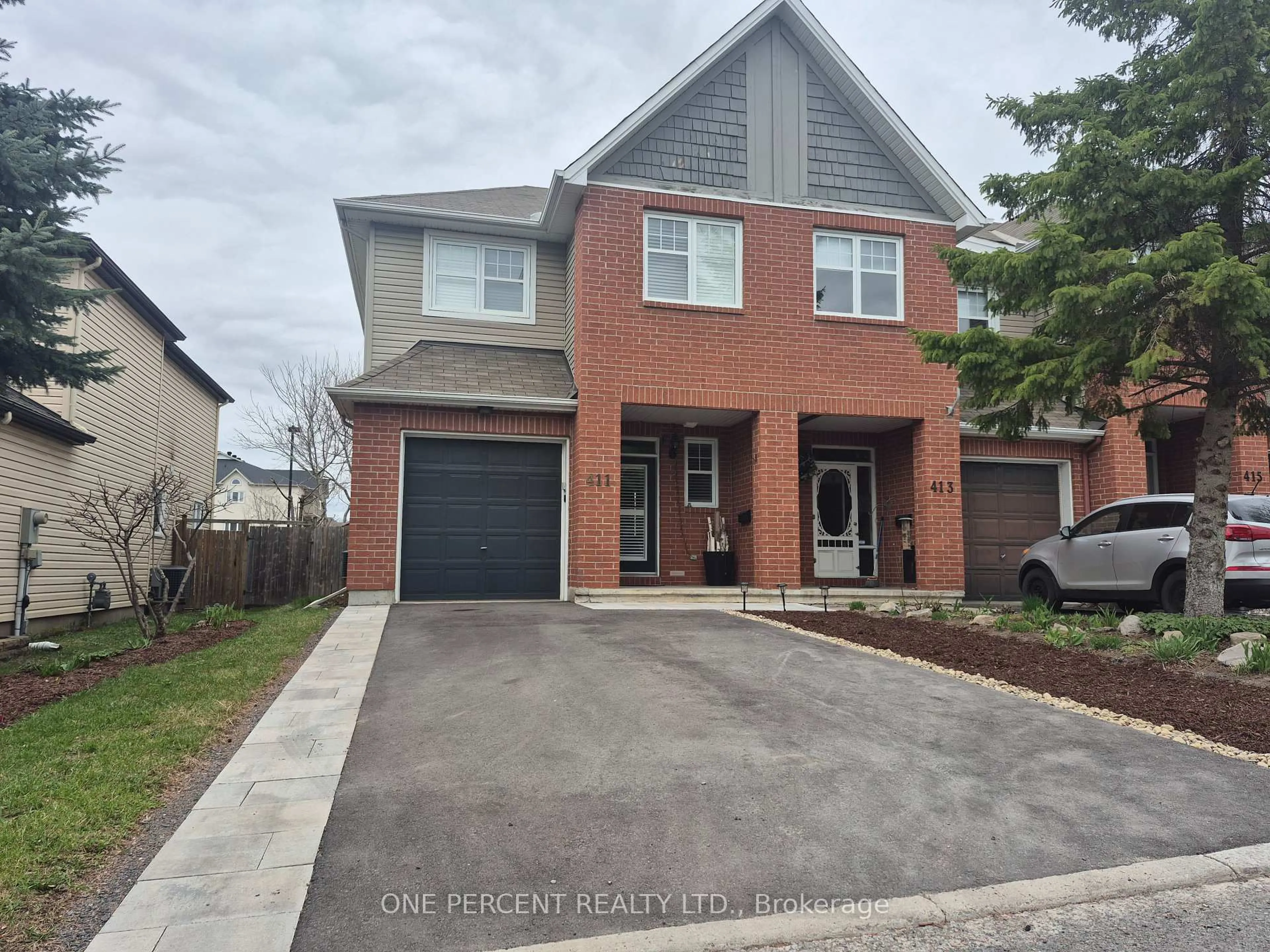 Home with brick exterior material, street for 411 Cache Bay Cres, Ottawa Ontario K1T 4H3