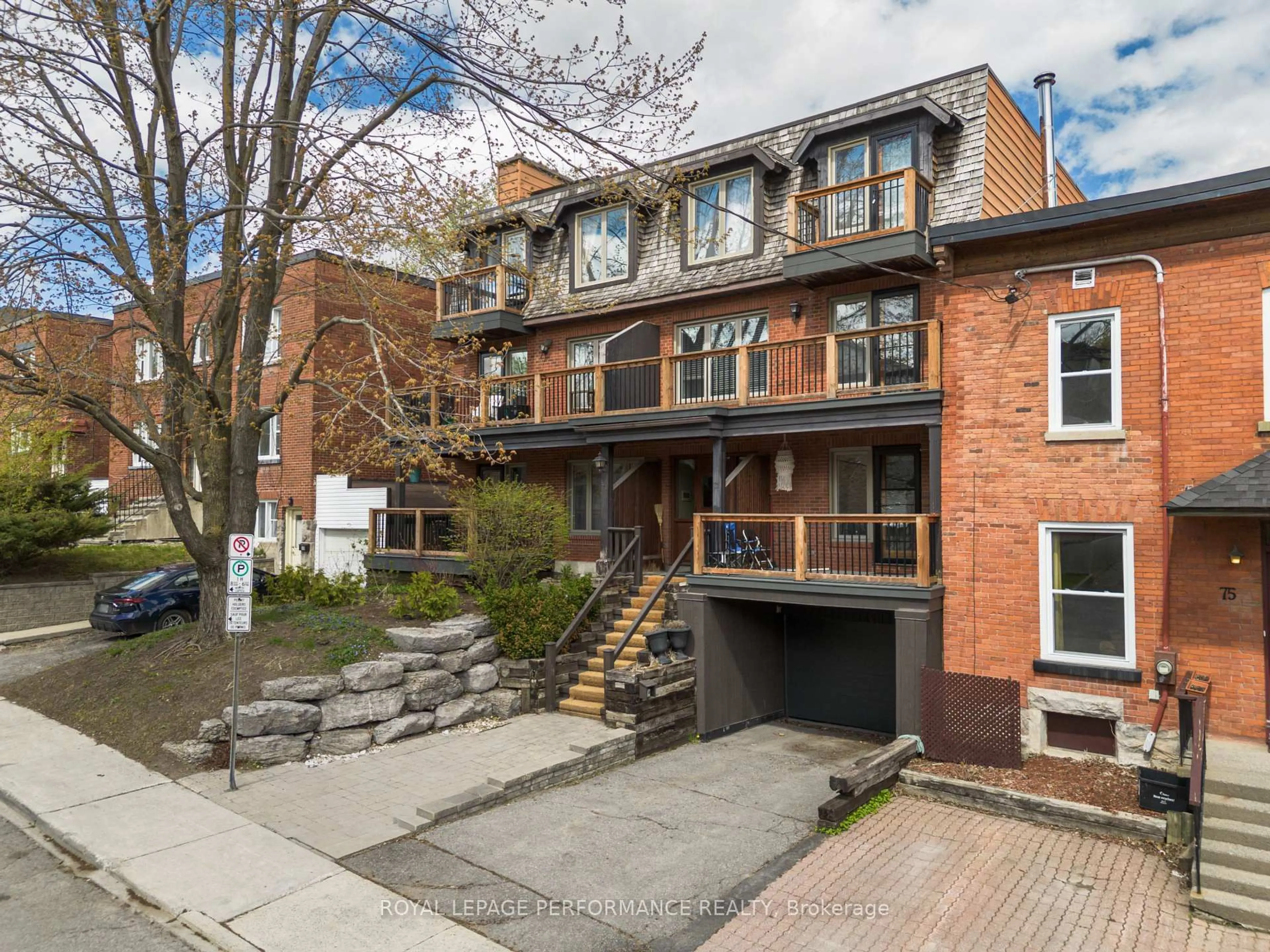 Home with brick exterior material, street for 71 Sweetland Ave #2, Ottawa Ontario K1N 7T9